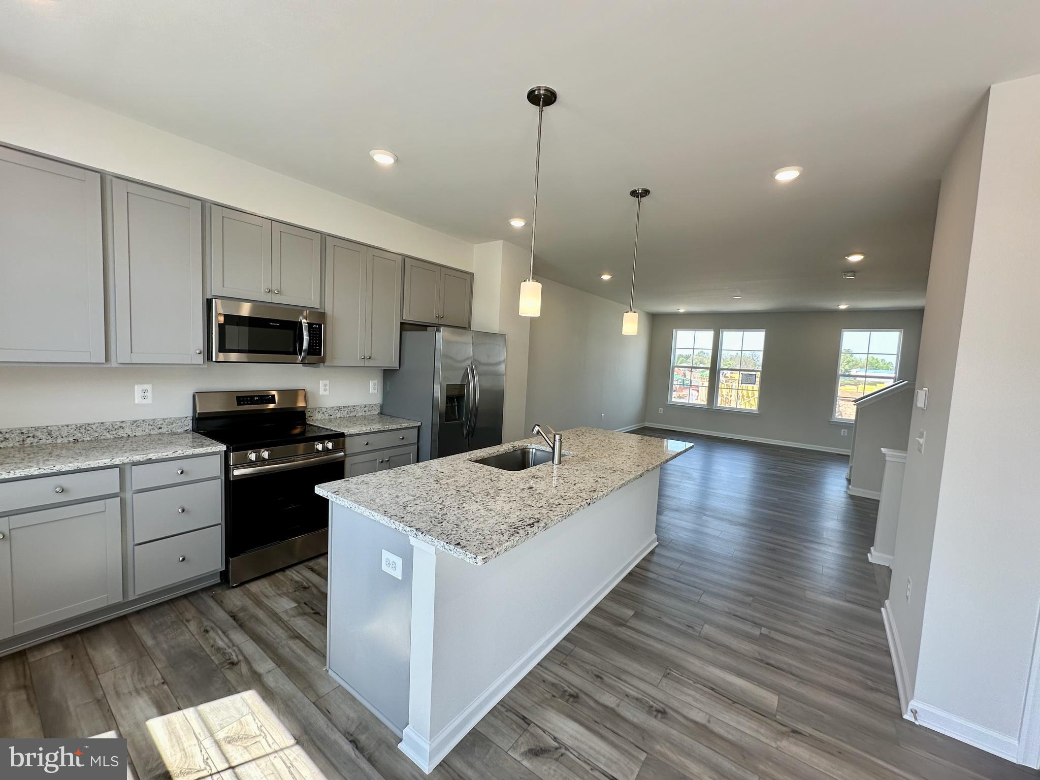 Be the first to live in this beautifully designed brand new three-story townhome that perfectly blends comfort and style. The first floor features a versatile recreation room, a convenient half bath, and a one-car garage. On the second level, you’ll find an open-concept layout with a spacious Great Room, dining area, a second half bath, and a modern kitchen complete with white ornamental granite countertops, stylish cabinetry in a sleek stone finish, and a pantry closet. Step out onto the 10x18 foot composite—ideal for relaxing or entertaining.
Upstairs, the third level offers three generously sized bedrooms, including a serene owner’s suite with a walk-in closet and a private bath. The laundry is conveniently located on the bedroom level.
This home is located in the wonderful Willow Glen community, nestled in the scenic Shenandoah Valley with easy access to route 81 and other commuter routes, and all of the growth happening in Inwood.