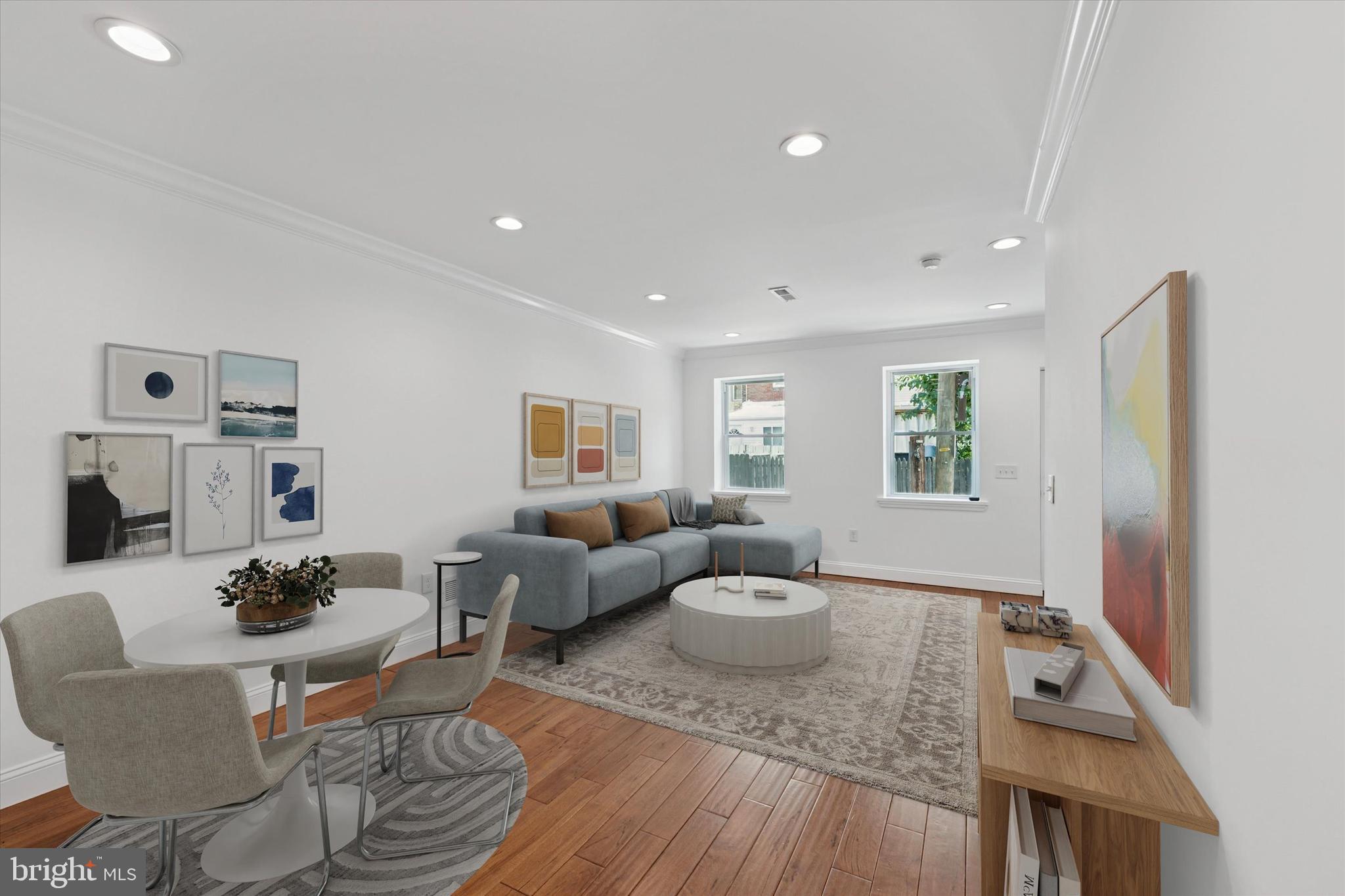 This beautifully renovated 3-story, 4-bedroom, 2.5-bathroom townhome offers modern living with thoughtful design throughout. Step inside to find gleaming birch cherry hardwood floors, recessed lighting, and an open-concept first floor that’s made for entertaining. The wide living room flows into a generous dining area and a sleek, updated kitchen complete with granite countertops, a center island with breakfast bar, stainless steel appliances, and direct access to a spacious backyard, ideal for summer grilling or an evening under the stars. A stylish powder room completes the first floor. On the second level, you'll find two well-sized bedrooms and a stunning hall bath featuring dual vanities, porcelain tile, and a tiled tub/shower combo. The third floor is a true primary suite retreat, boasting a rear bonus room (perfect as an office, nursery, or walk-in closet), a large primary bedroom, and a spa-like ensuite bathroom with dual sinks, modern porcelain finishes, and a glass-enclosed oversized shower. With ample storage throughout, natural light pouring in, and finishes that blend comfort with sophistication, 2630 E Harold Street is ready to welcome you home. Nestled just minutes from I-95 and steps from local favorites like Wawa, Dunkin’, Planet Fitness, and the vibrant York Street and Fishtown scene, this home places you at the intersection of convenience and community.