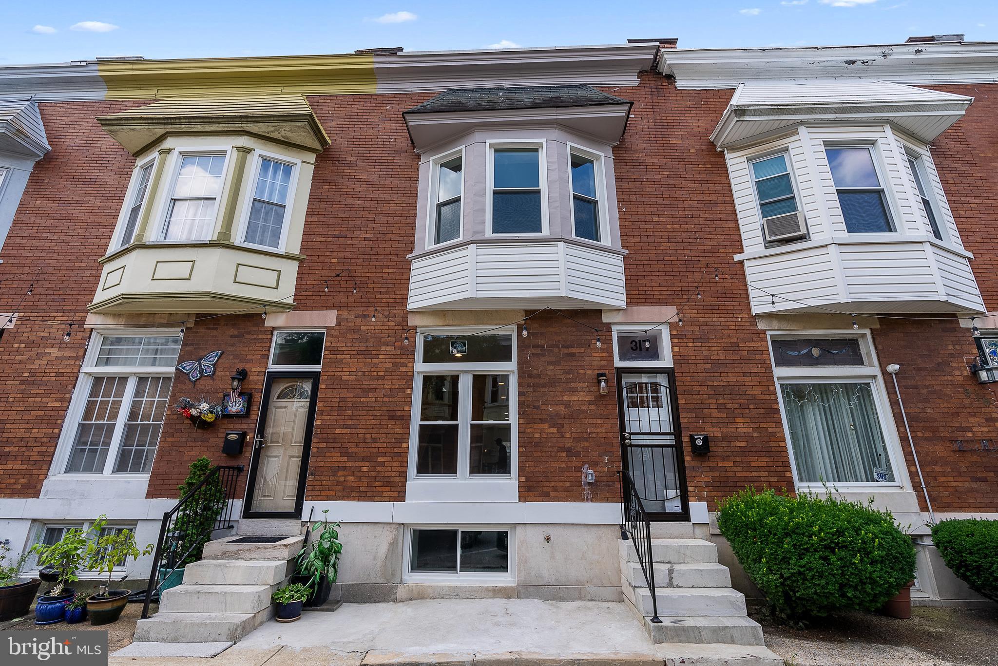 Must-See in a Prime Location! This beautifully fully renovated home features quality craftsmanship throughout and thoughtful modern design. Welcome to 317 E Lorraine Ave – a newly renovated 4-bedroom, 3.5-bath gem located on one of Harwood's most charming blocks, where overhead string lights illuminate the entire street, creating a warm and inviting vibe every evening. Steps from Charles Village and within the Johns Hopkins Homewood Campus district, Located just two blocks from campus security and close to Waverly Market, this home is ideal for homeowners or investors seeking rental income in a high-demand
area. Enjoy a sleek, modern aesthetic with high ceilings on the main level, an open-concept layout, exposed brick accent wall, and stunning hardwood floors throughout. The designer kitchen boasts quartz countertops and stainless steel appliances – perfect for entertaining. The main level includes a stylish half bath and laundry hookups. Upstairs offers three spacious bedrooms including a luxurious master suite with high ceilings, a walk-in shower, and modern tile finishes. The finished lower level offers a comfortable bedroom and full bath, ideal for guests, roommates, a stylish home office, or even a modern game room—flexible space with strong rental or lifestyle potential.Turnkey and ready to move in or rent, this property offers strong long-term value with new HVAC, 200-amp electric, and plumbing systems. All renovation permits were pulled and inspected by the city. Pictures with furniture are virtually staged.