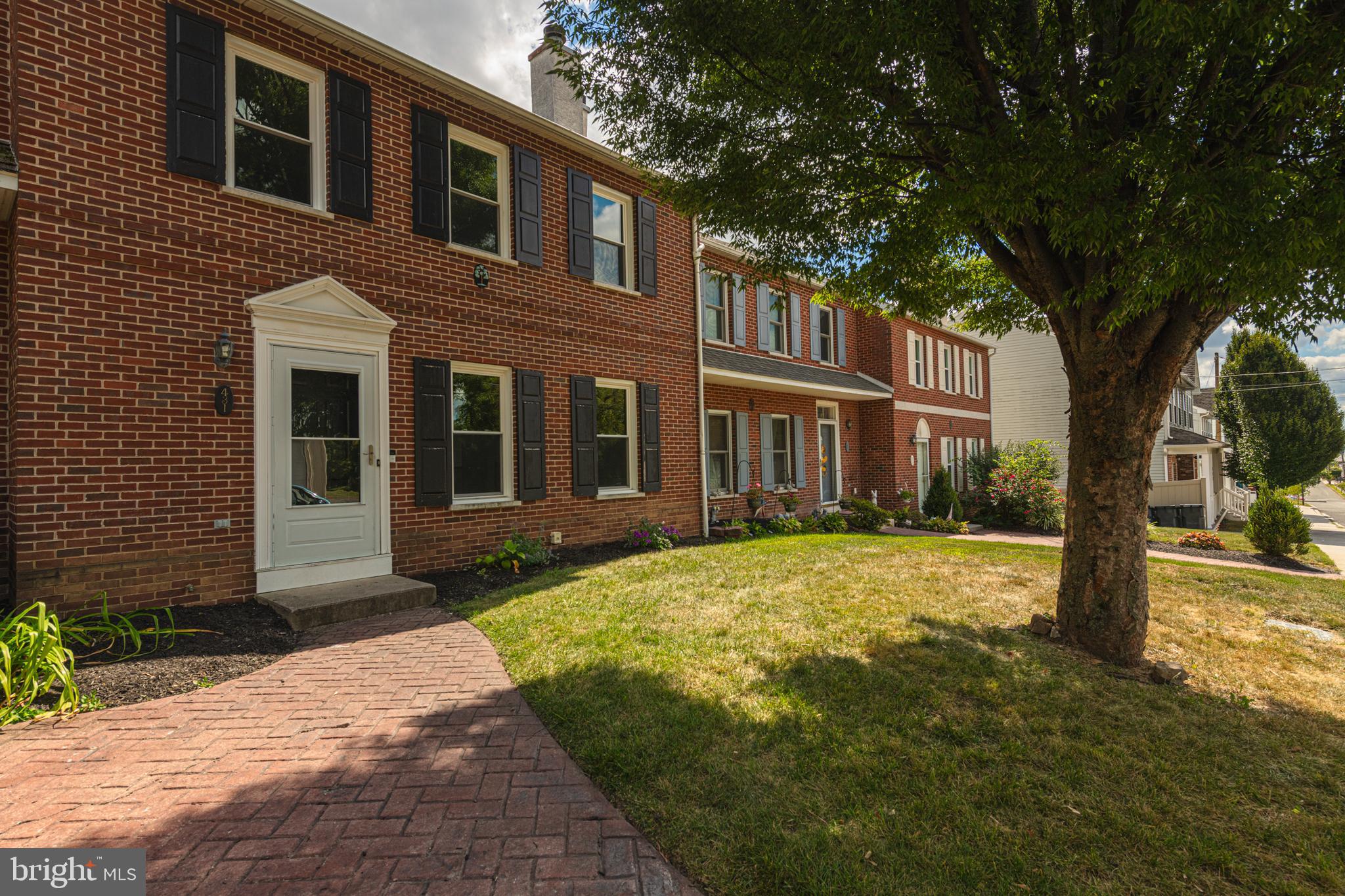 Welcome to this beautiful townhome located within walking distance to Downtown Phoenixville's shops and restaurants and well as community events. This awesome brick 2 story townhome features a gorgeous updated eat in kitchen with Dishwasher, built in microwave, stainless steel refrigerator with water/ice dispenser, Granite countertops, recessed lighting, subway backsplash and French Doors to the rear deck - perfect for relaxing and BBQ and small fenced area. Living room is very large and features beautiful built ins, recessed lights and wood burning fireplace with slate hearth! This level also offers you a 1/2 bath. The 2nd level brings you to two large bedrooms and a full bath with tub/shower combo, double sinks - renovated! You will find 2 off street parking spaces! A full basement. New updates include roof (2023), updated bathroom and kitchen, freshly stained deck, updated windows (2024) & water heater (2024). French Drain installed in 2019, Be sure to see this amazing home today! Association covers grass & snow - get your weekends back!