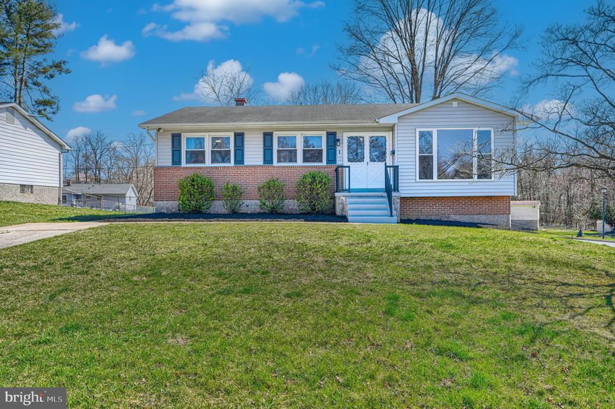 Located on a spacious corner lot with mature trees and a fenced backyard, this fully updated home is ready to impress. Step into the grand foyer that opens to a large living room filled with natural light from oversized windows. The open kitchen and dining area feature a roomy island, ample storage, and generous counter space. The main level offers three bedrooms and two bathrooms, while the expansive lower level offers a potential 4th bedroom. The utility and storage room is already plumbed for an additional bath, and the walkout basement leads directly to the backyard. Laundry is conveniently located on the main level. With brand-new exterior siding, luxury vinyl flooring, and cozy carpet in the bedrooms, this home is ready to welcome you.