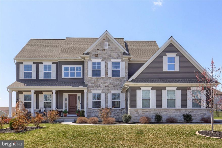 Nestled in the highly sought-after Meadowbrook Farms community and within the prestigious Cumberland Valley School District, this elegant two-story home offers 3,800 square feet of beautifully finished living space, complete with a 3-car side-entry garage.
Step inside to a dramatic two-story foyer, where rich wood plank flooring flows seamlessly throughout the main living areas. The heart of the home is an expansive white kitchen featuring solid surface countertops, a stylish tile backsplash, and a spacious dining area that opens to a sun-filled great room centered around a cozy gas fireplace—perfect for gatherings and everyday living.
The main level also offers a formal dining room ideal for entertaining and a private home office with classic French doors, providing a quiet retreat for work or study.
Upstairs, the luxurious primary suite serves as your private sanctuary with a relaxing ensuite bath showcasing a double vanity, walk-in tile shower, garden tub, and a generous walk-in closet. Three additional bedrooms—each with walk-in closets—share a full bath, and a convenient second-floor laundry room adds everyday ease.
The finished lower level provides even more versatility with a potential 5th bedroom or additional office, a spacious entertainment area, and a separate game room—plenty of room to relax, play, or host guests.
Step outside to the rear deck overlooking a manicured, level lawn—ideal for outdoor enjoyment with ample space for play, gatherings, or even a future pool.
This home blends timeless style with exceptional space and a prime location—don’t miss your opportunity to make it yours!