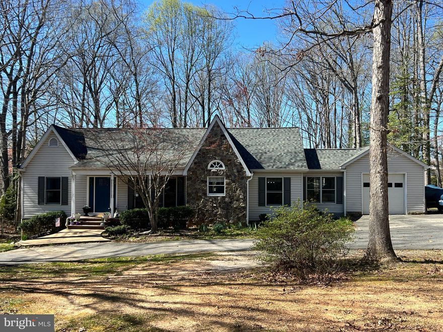 Welcome to 15 Berkshire Lane in the comfortable confines of the Berkshire neighborhood near Spotsylvania Courthouse! You will savor the best of both worlds with privacy and land in a location that is close by to everything! This cozy 3 bedroom, 2 bath rambler sits on 1.3 acres with an oasis of a backyard that can allow one to garden, relax by their small pond and just take a break from the everyday hustle and bustle. The owners have poured in plenty of upgrades recently which include a furnace that’s less than 5 years old, a hot water heater just 2 years old, a new gas fireplace in the family room, a newer washer and dryer, a new gas stove under 5 years old, a new Whirlpool refrigerator just 2 years old and a microwave that’s just a couple years old! Like the "new" themes...well it continues! The master bathroom features a beautiful new vanity with granite countertops, a new exhaust fan and new windows, and the Master bedroom also has new windows. The potential and opportunity also exist with the unfinished walk-up attic that can offer more living space once built out, whether as an extra bedroom, office, or just recreational room. Lastly, the crawl space is enormous for extra storage and high enough to walk through. Just 5 minutes from the Spotsylvania Courthouse Village area and just 15 minutes to nearby shopping and the VRE station, this won’t last long! Come see it today!