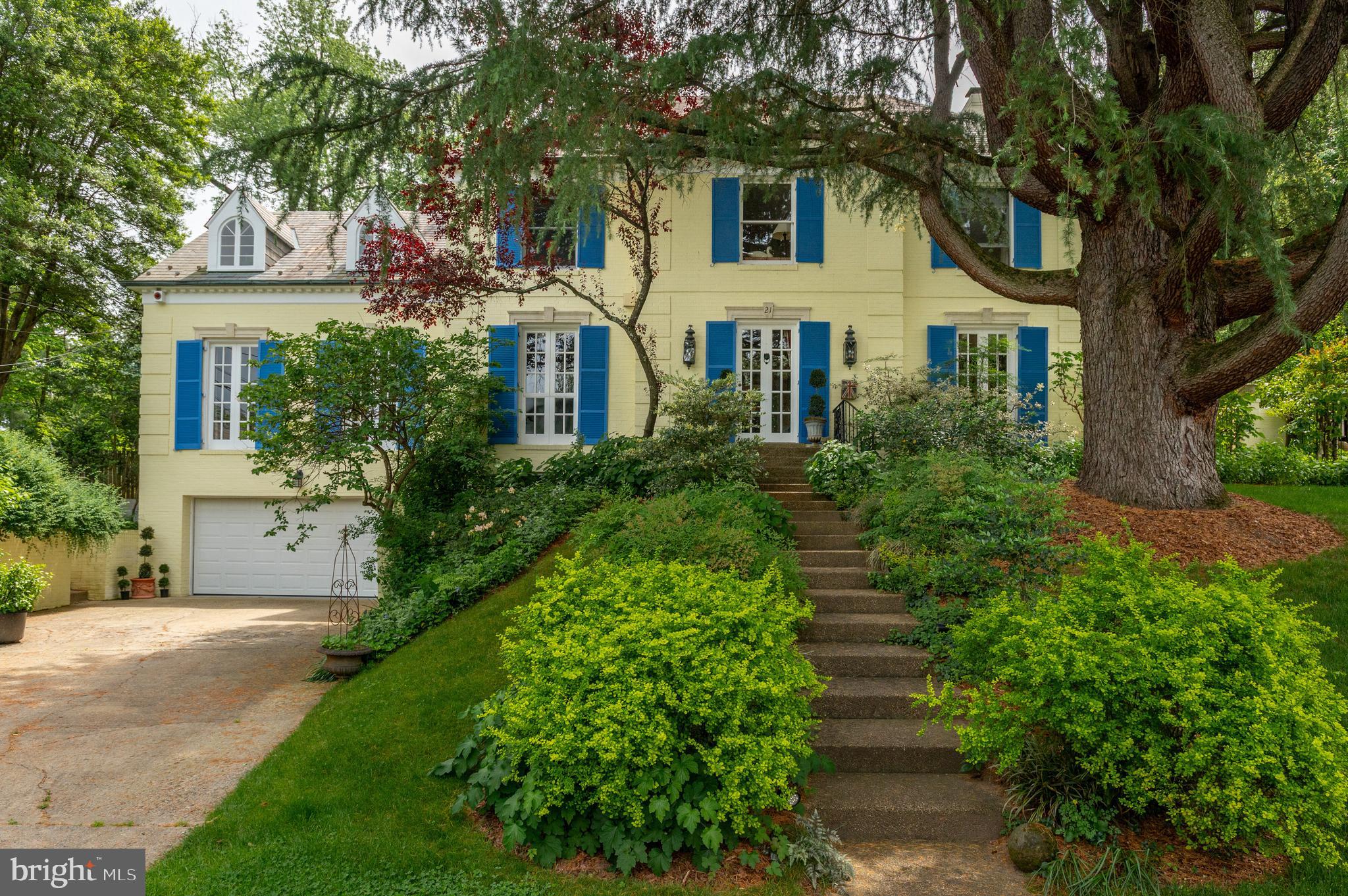 Located on a serene, private .34 acre lot on a cul-de-sac in the highly sought-after Chevy Chase neighborhood, this exquisite lovingly cared for home transports you to the French country and highlights beautiful finishes, oversized windows, and custom built-ins. The English garden landscaping and pool complement the spacious 4,500+ square foot floor plan, giving the home an excellent flow for entertaining and everyday living. The one-of-a-kind, multi-level garden features a large, stunning heated in-ground pool, garden, and a variety of flowers and plantings that bloom throughout the year, creating a true outdoor retreat. The main level boasts a sun-drenched formal living room with a window seat with views of the pool and gardens and wood-burning fireplace. The living room opens up to the elegant dining room and family room with custom built-ins, wood-burning fireplace, and French doors leading to the expansive back patio. At the center of the home is a sun-filled, gourmet eat-in kitchen with granite and limestone countertops, ample cabinetry, center island, and high-end stainless steel appliances. Completing the main level is a private office with a wet-bar, welcoming foyer with a coat closet, and powder room.
The second level features four generously-sized bedrooms and three full bathrooms. The primary suite has a large window with views of the garden oasis and boasts a dressing room complete with ample storage and an ensuite bathroom with a walk-in shower and separate tub. The third floor offers an additional bedroom with an ensuite bathroom and an expansive attic space with the potential to be finished, offering endless possibilities for additional living space or storage. Rounding out this exceptional home is the lower level with a recreation room, bonus room with an ensuite bathroom, ample storage, laundry area, and access to the attached two-car garage. This home is ideally located within close proximity to the new shops and restaurants in Chevy Chase, downtown Bethesda, Rock Creek Park and the future Connecticut Avenue Purple Line stop with all of its surrounding shops and restaurants.