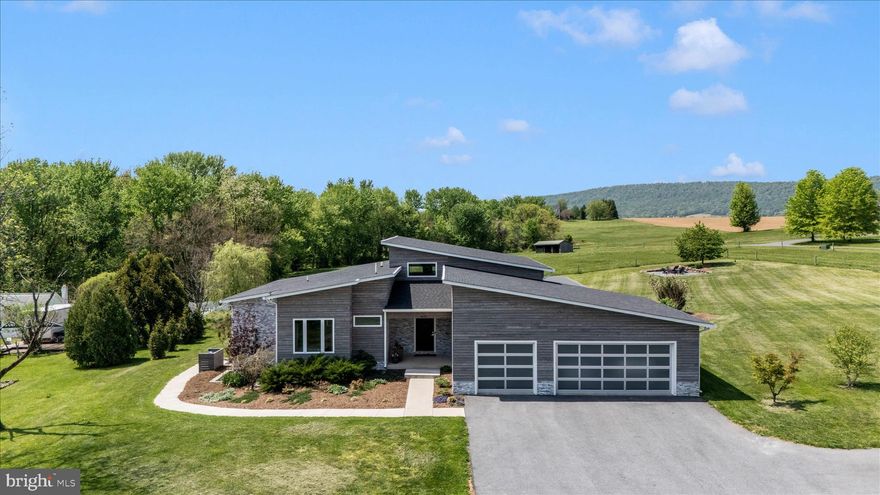 Set on nearly two acres in a quiet, established setting, this recently built home offers a rare combination of space, flexibility, and modern design. With over 5,000 finished square feet, the layout is designed to accommodate a variety of living arrangements, including extended stays, guests, or potential supplemental income.
The main living areas are open and inviting, centered around a well-appointed kitchen and generous gathering spaces filled with natural light. Multiple bedroom suites and well separated living areas provide both comfort and privacy, making the home as functional as it is spacious.
Outside, the property features a level lot with scenic surroundings and plenty of usable yard space, well suited for outdoor living and offering the potential for a future pool, buyer to verify. The setting provides a sense of privacy while remaining convenient to nearby commuter routes, shopping, and everyday amenities.
Additional features include a large garage, ample parking, and newer systems throughout. With its size, condition, and versatility, this property presents a unique opportunity in the market.