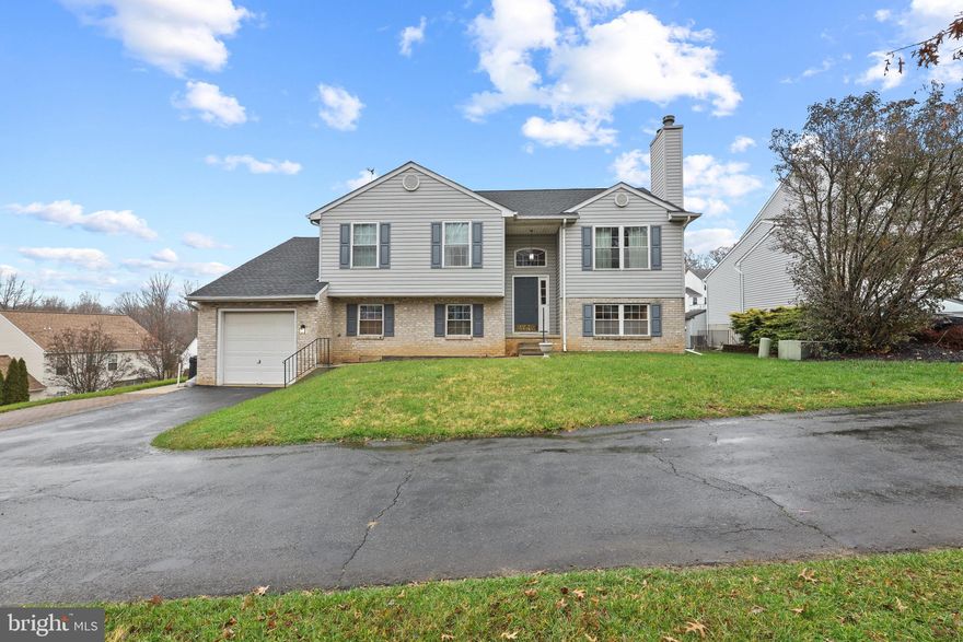 With amazing outdoor and indoor features, this house will not disappoint you! Sitting on 0.21 acres, backing out to over 1 acre common area in the beautiful Equestrian Acres, this split level home, located at the end of a dead-end street, features 3 bedrooms and 2 full bathrooms.
The cathedral ceiling welcomes you to the main floor where you'll find a spacious living room with a cozy wood burning fireplace, the dining room with access to the beautiful large deck,  and a nice kitchen with wall oven, electric cooktop, and plenty of counter space. Three bedrooms, a full bathroom, and the laundry room complete this floor.
On the lower level, there is a great room with a second wood burning fireplace, another full bathroom, and a recreation room for entertainment or enjoyment. Access to the 2-car tandem garage is also on this level, as well as 2 walkout doors to the large patio.
Come take a look and let's make this one your next home!