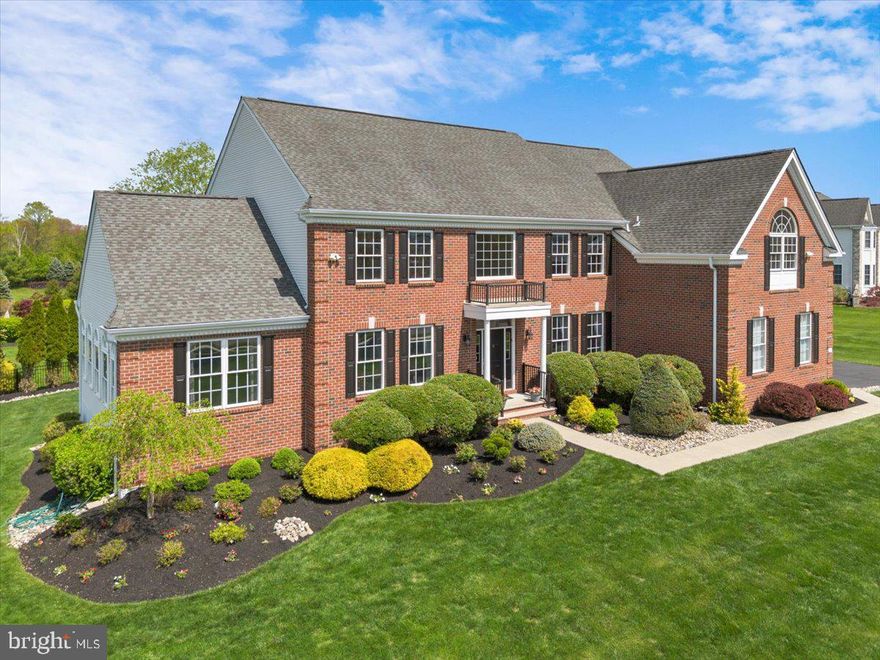 Impressive Corner Property Offering the Lifestyle You Deserve.
Welcome to this stunning corner property where elegance meets comfort. Step into a dramatic two-story foyer with a grand front staircase that opens to a second-floor landing overlooking the Great Room. Throughout the home, you'll find exquisite details such as hardwood floors, tray ceilings, recessed lighting, crown molding, wainscoting, architectural columns, and fine wood trim.
To the left of the foyer, the formal living room sets the tone for sophisticated entertaining. Adjoining it is the light-filled conservatory—currently used as a billiards and game room—offering panoramic views of the front, side, and rear yards through expansive windows.
On the right, the formal dining room is perfect for hosting holiday celebrations and elegant dinners. The gourmet kitchen is a chef’s dream, featuring raised-panel cabinetry with ribbon-etched detail, coordinating countertops, a tile backsplash, luxury plank flooring, stainless steel appliances, a built-in desk, and a large center island. The walk-in pantry boasts custom built-in shelving and drawers for optimal organization.
Adjacent to the kitchen, the spacious breakfast room and sunroom overlook your private backyard paradise. Past the back stairway the massive Great Room is a showstopper with soaring windows and a gas fireplace. A dedicated study with dual entryways and a full closet offers a quiet place to work or read. A half bath and laundry/mudroom complete the main floor.
Upstairs, the primary suite is a true retreat with a tray ceiling, a private sitting area, and a corridor leading to three custom walk-in closets. The luxurious en suite bath includes dual extended vanities, a soaking tub, a glass-enclosed shower, and a private water closet.
The upper level also includes a prince/princess suite with a private bath, two additional spacious bedrooms, and a shared hall bathroom.
The finished basement expands your living space with a TV viewing area perfect for movie nights or game days, a home gym zone, a craft/play area, and a full bathroom. An additional full home office with a separate exterior entrance and walk-up access offers incredible flexibility—ideal for a home business or future in-law suite.
Step outside to your backyard oasis featuring a saltwater pool, stone-finished outdoor kitchen, and deck—ideal for entertaining, relaxing, or family fun. A pool fence ensures safety while leaving plenty of open yard space for play.