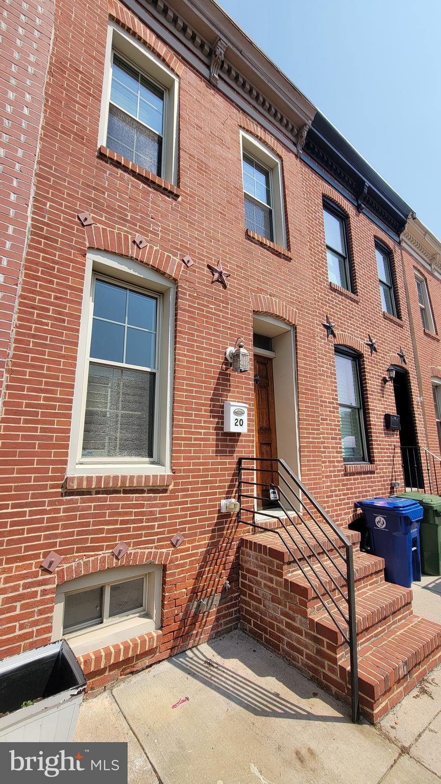 THIS IS THE ONE YOU'VE BEEN WAITING FOR! Charming, modern-industrial style home with original hardwood floors, exposed brick wall, updated kitchen & baths, 2nd level laundry, open staircase and MUCH, MUCH, MORE! Finished basement is a perfect family-room or 3rd BR. Entertain on your private courtyard or on your very own ROOFTOP DECK! Peace & quiet, yet close to everything Federal Hill has to offer. WELCOME HOME!
