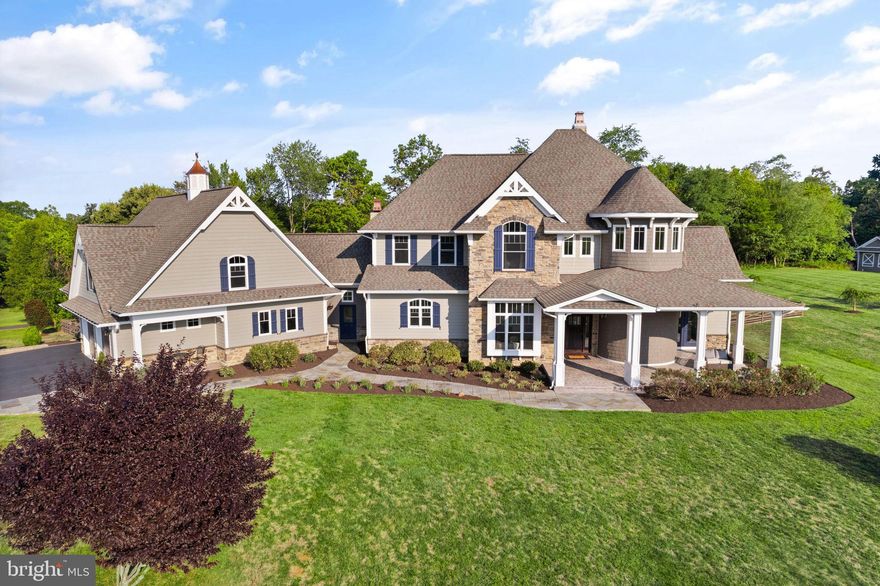 APPOINTMENT ONLY!  Please do not show up without appointment.
WELCOME HOME! Overlooking Bull Run Mountain, this custom Craftsman-style estate is situated on 10 picturesque acres in the Evergreen Estates Community of Haymarket. Enjoy the perfect blend of refined elegance and natural beauty in this exceptional property. Located in Western Prince William County, this home offers the tranquility of country living with easy access to modern conveniences, including commuter routes, shopping, dining, healthcare facilities, and local attractions like vineyards and breweries.

Built in 2015, with recent remodeling throughout along with extensive landscaping,  this charming home is perched atop a hill crest, providing stunning panoramic views of the mountains and the beautiful Virginia countryside. The back of the property features dense trees, walking and ATV trails, a brook, and several tree stands. The abundant wildlife, including deer, foxes, and various bird species, enhances the serene atmosphere. The contemporary-style turret and distinctive rooflines make a striking impression as you approach the cul-de-sac.

This amazing home features 6 bedrooms and 6 full bathrooms across three levels, including a separate garage apartment with its own kitchen and living area. The main level boasts a master bedroom suite with a luxurious bathroom and ample privacy. The breathtaking 3-story winding staircase in the turret, extensive wood trim, columns, shadow boxes, and hardwood floors add timeless elegance throughout.

The dining room offers a view of the open foyer, perfect for entertaining. A private office with serene mountain views is located behind the staircase. The Great Room, filled with natural light from walls of windows and sliding glass doors, opens to a covered porch with a fireplace and a private lanai with a hot tub. The space also features a striking gas fireplace with an ornate mantel.

The gourmet kitchen is a chef’s dream, equipped with top-of-the-line stainless steel appliances, quartzite countertops, a ceramic tile backsplash, and a pot filler. A butler’s pantry and walk-in pantry with an extra refrigerator provide extensive storage. The adjacent laundry room and mudroom/breezeway connect to the garage, featuring a shower for easy cleanup after outdoor activities.

The oversized 3-car garage offers additional storage space, while the upper level includes 3 bedrooms, 2 bathrooms, and a large gathering room suitable for a game room, home theater, or office. The lower level features a spacious family room, wine cellar, gym, bar, card table area, and dedicated spaces for ping pong, pool, and air hockey. An additional bedroom, full bath, and dual storage areas complete this level.

This estate home combines luxury and functionality, offering a year-round vacation experience with unmatched comfort and convenience.