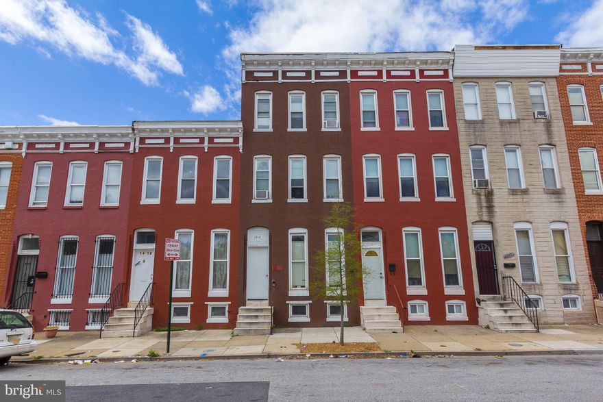 3 LEVEL OLIVER ROWHOME WITH UNPARALLELED SPACE! Main level with living room, separate dining room & kitchen, 2nd level w/ 3 large bedrooms & 1 full bath, 3rd level with additional 2 bedrooms, full basement is perfect for storage and has a 2nd full bath.  Tons of renovations going on in the area make this an incredible opportunity!