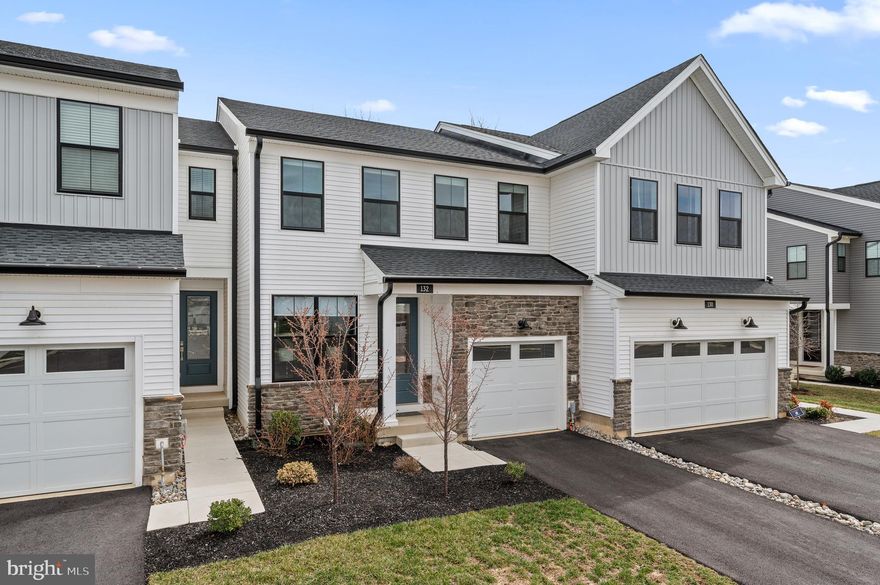 Welcome to this newly constructed townhome in the charming community of Stonebrook, Upper Merion. Completed in 2023, with FINISHED LOWER LEVEL WITH FULL BATHROOM,  this property combines modern design with comfortable living, providing an ideal setting for families or individuals in a wonderful convenient location. As you enter through the front door, you're greeted by a spacious open floor plan that is flooded with natural light. This layout is perfect for both entertaining and everyday living. The front room offers versatile living space suitable for a variety of needs, whether it's a formal sitting area, home office, or playroom. The open kitchen features an island with seating, making it a great spot for casual meals or socializing while cooking. Adjacent to the kitchen, the breakfast area flows seamlessly into the family room, which overlooks a lovely deck, perfect for outdoor relaxation. This level is completed with a powder room and access to your garage. The 2nd level boasts three spacious bedrooms, each designed to offer comfort and privacy with modern fixtures and ample storage. The primary bedroom is a true retreat, featuring a generous walk-in closet and an en suite bathroom complete with a dual vanity, enhancing your daily routine. A conveniently located laundry room completes this level, adding to the home's functionality. The current owners have expertly finished the lower level, creating a special space that is both spacious and inviting. It features beautiful carpeting and a full bathroom, making it an ideal area for a guest suite, media room, or recreation area. Accessible from the family room, the deck provides a great space for outdoor dining or lounging, with steps leading down to the backyard—a perfect spot for gardening or play. Stonebrook offers unmatched convenience with its proximity to the King of Prussia Town Center, renowned for its shopping and dining options. You can also enjoy easy access to the Chester Valley Trail, nearby parks, and other recreational facilities, enhancing your lifestyle with outdoor activities. This townhome in Stonebrook is a must-see, offering a blend of modern living and community charm. The current sellers have put so many beautiful upgrades into this unit, it shows like a model home!  Don't miss the opportunity to make this beautiful property your new home.