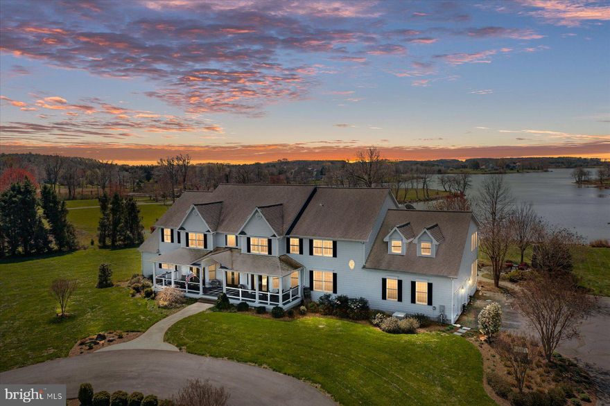 Spectacular Kent Point WATERFRONT on Northwest Creek! Truly a Peaceful setting that gives you that "On Golden Pond" feel and welcomes you to your VERY OWN PRIVATE OASIS! This luxurious Waterfront Home is nestled on a Tranquil and Picturesque "Pond-like" body of water, offering Breathtaking VIEWS and an idyllic setting for a truly Serene Lifestyle... Osprey Nest and Westerly SUNSETS included! Very well maintained and immaculate this 6600+sqft Custom built Home with Hardi-plank siding and endless beauty is sure to please! Walking into the Grand two-story foyer, the endless Waterviews capture you immediately!  Offering an open floor plan and boasting 5 Bedrooms, 4.5 Bathrooms, Large Office, Sitting Room, Dining Room, a massive Gym/Play/Toy room, TV Game Room with exposed brick wall, Wet Bar and Regency Gas Stove, and an array of High-end Finishes and Upgrades all throughout!  The Gourmet Kitchen features Stainless Steel appliances, extensive Granite countertops and Granite breakfast bar, stunning Custom Wenge Wood Cooktop Island, Double Wall Oven and ample Cabinet space with lots of storage.... making it just perfect for entertaining guests and preparing delicious meals for the Chef in you! Relax in the substantial two-story Living Room complete with gleaming Hardwood Floors, Gas Fireplace, Built-In Shelving, Soaring Ceilings and floor to ceiling Windows that let in the warmth of the Natural Sunlight and of course, showcases those Stunning Views of the Water! The sizable main level Primary Suite is a true Retreat complete with a luxurious Ensuite Bathroom offering an Upgraded Tiled Shower, Soaking Tub, Dual-Vanities and Private entrance onto the maintenance-free deck overlooking the Water. The second Primary Ensuite located on the upper level has Tray ceilings, a huge walk-in closet with custom shelving, sitting area, 2nd closet, tiled shower and 2 sinks. Outside, the Beautiful Landscape and Hardscape is Endless with opportunities to entertain and have Outdoor Fun! Take a dip in the pristine in-ground, heated, concrete Pool or grab your SUP board and Kayak and head down to your private Pier for fun time on the Water! Sip your morning coffee on the covered Front Porch Swing overlooking the 16-Acre Estate, enjoy Crab Feasts on the screened-in porch while the ceiling fans keep you cool and end the day with an evening glass of wine, snuggled up to the outdoor Fireplace while listening to the Garden's Waterfall on the custom patio!  Located on the highly sought-after Chesapeake Bay's KENT ISLAND, this home is just minutes to local shopping, seafood restaurants, markets, dining, marina's, boat ramps, beaches, parks and the Kent Island Cross-Trail! Don't miss your chance to own this Exquisite Home and start living the WATERFRONT lifestyle of YOUR DREAMS! Horses are welcomed here too!