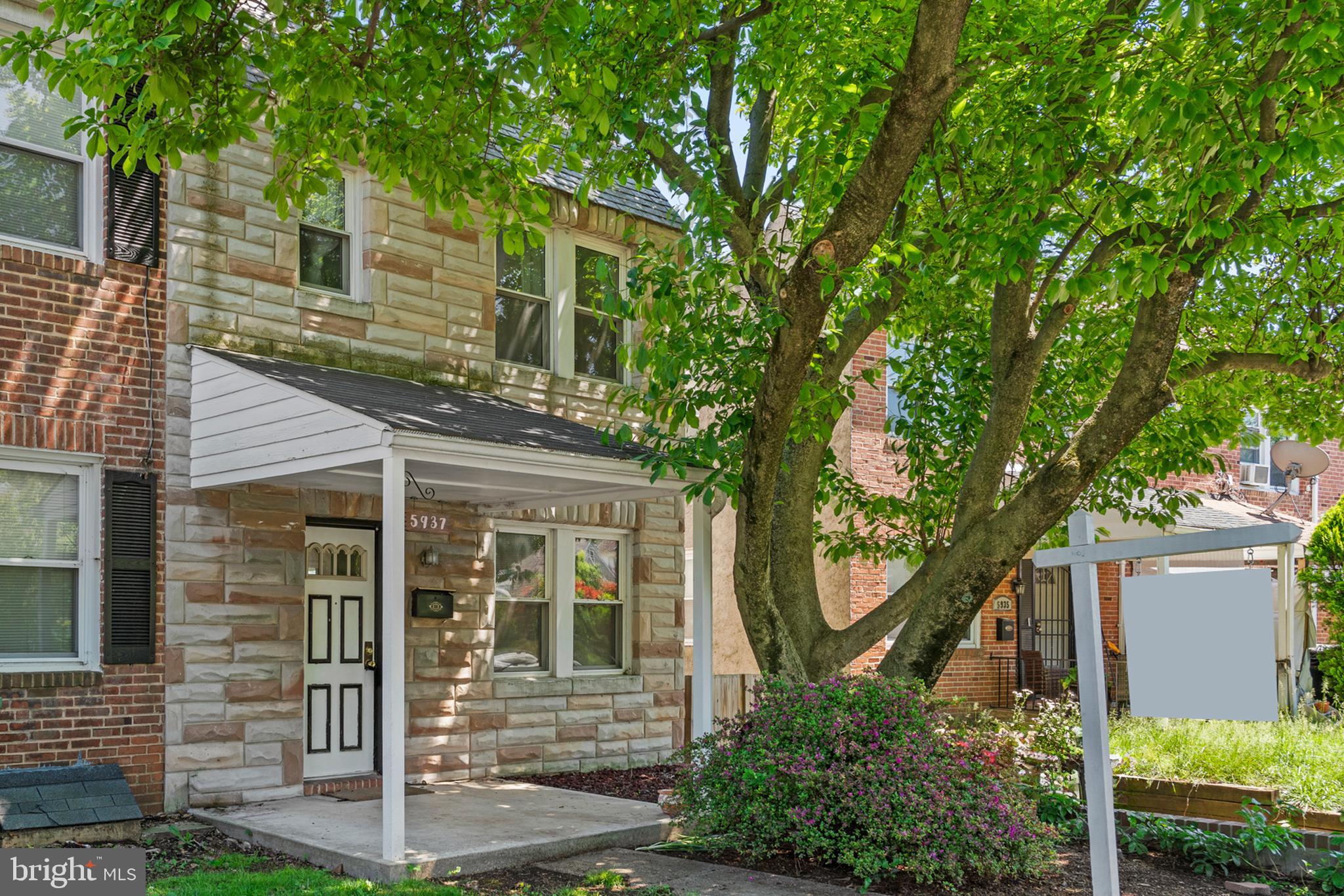 OPEN HOUSE CANCELED>Welcome to this cozy 3 bedroom 2 full bath townhome. This end of group home has a beautiful specimen Magnolia in the front yard that provides shade all summer long! The main floor is well planned with a full-size kitchen living room and dining room with original wood floors. Off the kitchen is an enclosed sun room with big windows to let in lots of natural light! You will find a large primary bedroom with closets and 2 additional bedrooms with plenty of space. The bathroom is the traditional back and white subway tile. The basement has been finished with a full bathroom , sitting area, laundry area and bonus space. Access to the shaded back yard is from the basement or the side yard gate. This home is waiting for you to make it yours!