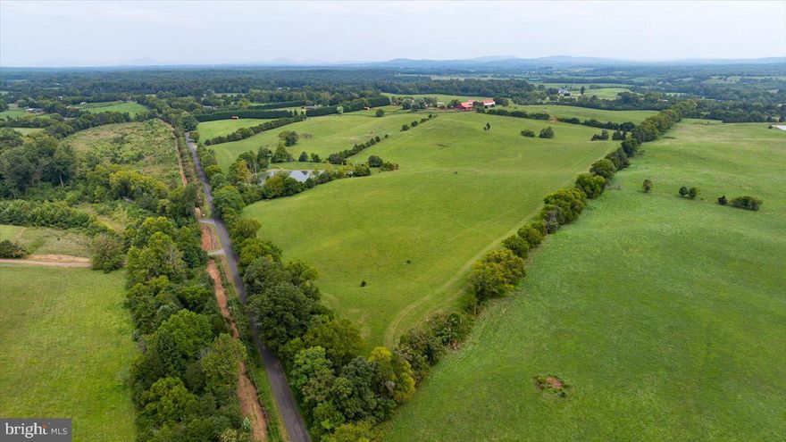Unlock the potential of this stunning 97.34 acres of prime land that offers a unique blend of natural beauty and strategic potential. Nestled in a desirable location, the property features diverse topography, including gently rolling hills and open fields.  The land is ideally suited for a variety of uses, whether you're looking to build a home for yourself, develop an equestrian facility, establish agricultural ventures, or create a recreational retreat. Its accessibility to major roads and proximity to local amenities enhance its value, making it a prime investment opportunity.  Key features include spacious pastures with ample room for grazing lush, healthy grass.  Perfect for rotational grazing and keeping your animals happy and healthy.  Water access featuring natural water sources and reliable access to utilities make this property functional and convenient.  Enjoy the potential for constructing an arena or round pen to enhance your equestrian activities.  Rich in wildlife and scenic views, the property also boasts potential for eco-tourism or conservation efforts. With ample space for infrastructure development, this expansive parcel presents endless possibilities for visionary buyers. Whether you envision a serene estate, a sustainable farm, or a vibrant business opportunity, this land provides the perfect canvas.