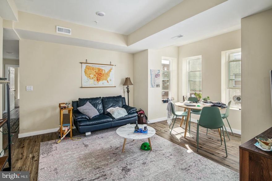 Bright and cheerful second-floor two-bedroom, one-bath corner apartment available for June 1st! Features a newer renovated kitchen, dining alcove cantilevered over Morris Street with sunny windows, wood floors throughout, and in-unit washer and dryer. There is a $50.00/month water/sewer charge paid to the landlord in addition to the monthly rent. Photos are from previous tenant's occupancy.