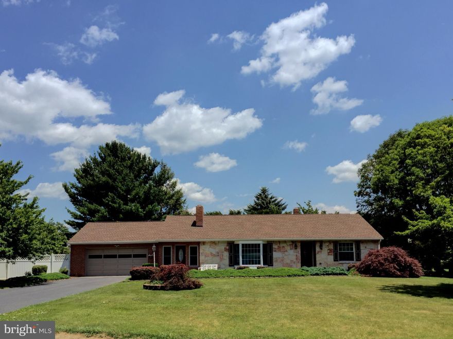 Updated and well maintained all brick and stone rancher.  Spacious rooms, wood floors, replacement windows, newer roof, central air, natural gas fireplace and furnace, full basement with partial finished family room w/fireplace, large shed w/ electric, vinyl fence, rear patio and covered porch, beautifully landscaped w/ fish pond.  Full pictures coming soon!