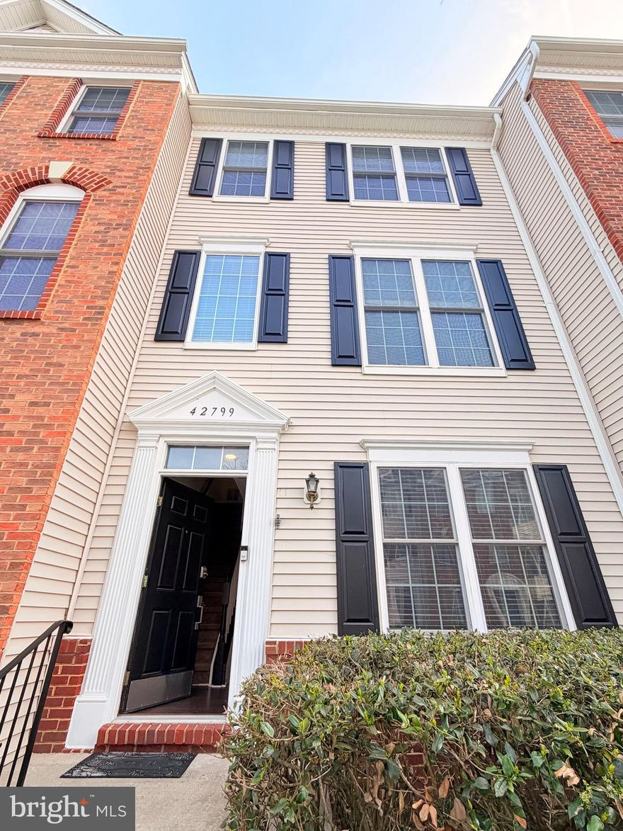 Welcome to this beautifully updated townhouse condo in a prime location! Conveniently located within walking distance to Hutchison Farm Elementary School and the community clubhouse, where you’ll enjoy resort-style amenities including pools, a 24-hour fitness center, courts, and playgrounds.

Step inside to the main level where you’re greeted by a versatile bedroom or office space, complete with its own full bathroom—perfect for guests or a quiet work-from-home setup. This level also provides access to the attached 1-car garage with additional storage space.

Upstairs, you’ll love the bright and open layout featuring a spacious living room, dining area, and an open-concept kitchen with a bar that seamlessly connects the space. This level also includes a convenient half bathroom and laundry area. Step out onto the private balcony/deck—perfect for relaxing evenings and enjoying beautiful sunset views.

The upper level offers comfort and privacy with three generously sized bedrooms and a full bathroom. The primary suite is filled with natural light and features a walk-in closet, while the additional bedrooms provide flexibility for family, guests, or office use.

Recent updates include brand new flooring (2024), bathroom upgrades, and fresh paint throughout. The community has also recently replaced the roof (March 2026), and the balcony/deck is maintained and renewed every 5–7 years.

Enjoy low-maintenance, amenity-rich living in a well-maintained community—this home truly offers comfort, convenience, and peace of mind.

Come experience it for yourself and feel right at home!