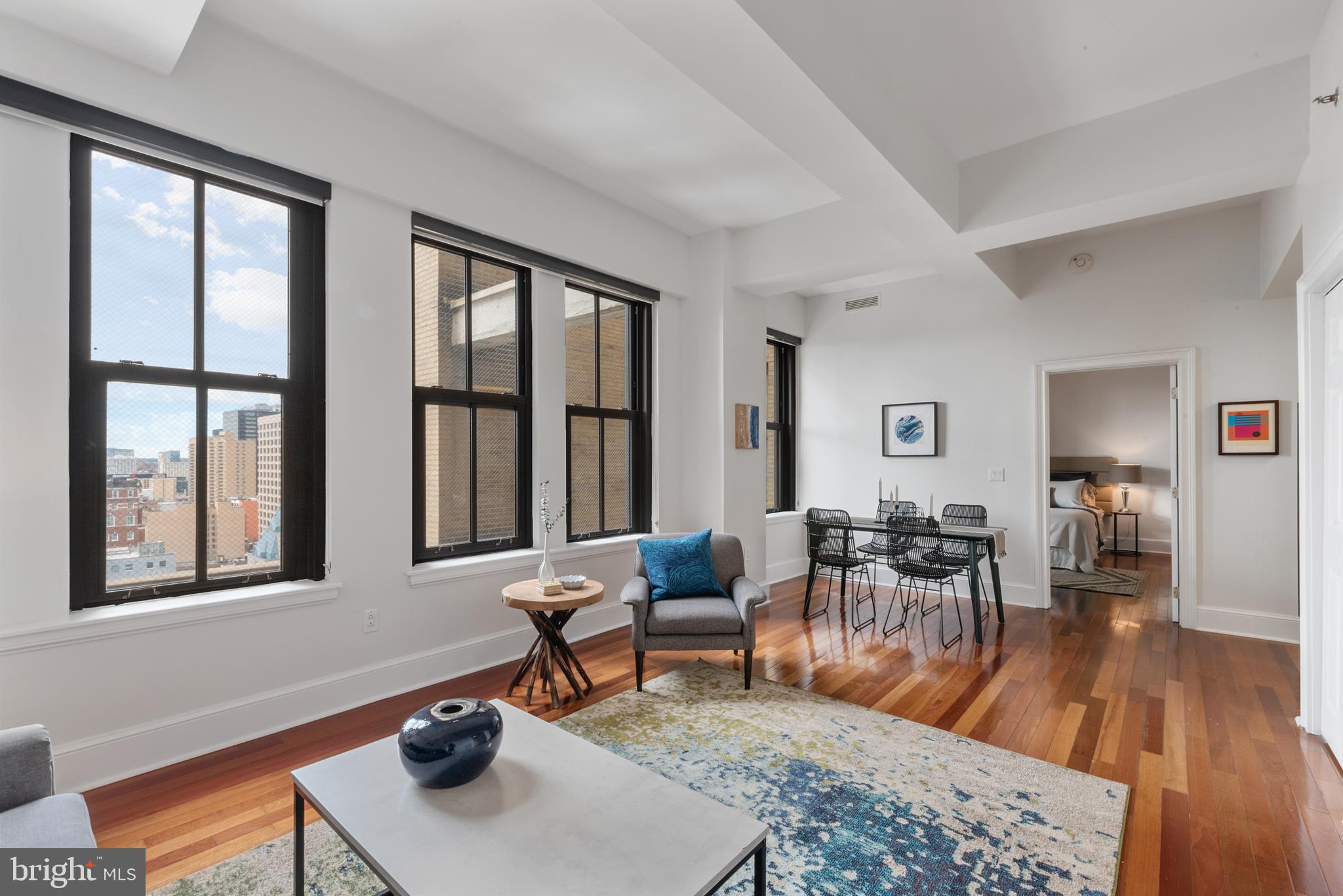 Light-filled, spacious 1 bedroom residence. This gorgeous home on the second highest floor offers big windows, high ceilings, hardwood floors, and lots of character. The kitchen features Poggenpohl cabinetry, stainless appliances, and granite countertops. Wonderful western light. Washer/dryer. Ample closet space. The luxury Ellington offers a 24-hour desk person, residents-only Fitness Center and Clubroom, 24-hour emergency maintenance, video monitoring, and more. The Ellington was awarded the William Penn Award of Excellence for a newly-converted condo building in 2006. Storage units also available for $30 a month. Pet Friendly building where location is key. Easy to walk or SEPTA to work and just blocks from Rittenhouse Square, restaurants, shopping, theater, transportation, and all that Center City has to offer. Located across from the exciting new W and Element Hotels opening soon, Del Frisco's Steak house, Ritz Carlton and many award winning restaurants. Fabulous Chestnut Street with great shopping, including shops at Liberty Place, Uniqlo, Nordstrom Rack and Bloomingdale's Outlet. Blocks from City Hall, Comcast Centers, Suburban station and the Broad-Street line. Just a wonderful condominium in a most convenient location (100 WalkScore, 100 TransitScore). Condo Fee includes: Heat, Water/Sewer, Insurance, Reserves, 24-hour desk and on-call maintenance, all common area maintenance and utilities, trash, snow, club room, fitness room, and more.