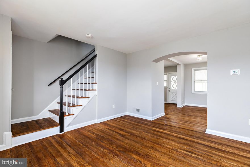 This two bedroom , one and a half bath home is ready for its new owner! Updated kitchen with new cabinets, stainless steel appliances, tile back splash and quartz counters.  Refinished hardwood floors and freshly painted throughout. Updated baths with tile shower upstairs. Finished basement for extra living space. New furnace and hot water heater. Central air and heat. Parking pad in rear.