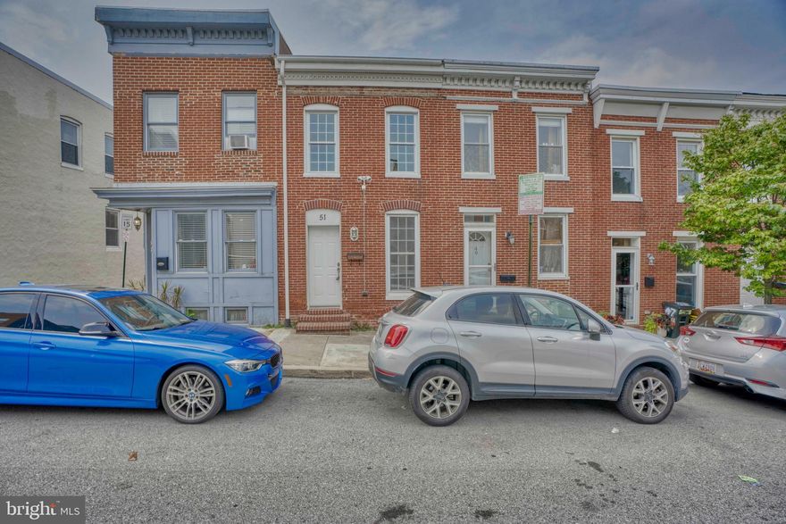 Quintessential rowhome in the heart of Federal Hill offers an open concept floor plan on the main level w/  half-bath, re-finished hardwoods, eat-in-kitchen w/ granite counters & breakfast nook/ possible home office space w/ vaulted ceiling & skylights! 2nd level has 2 bedrooms w/ NEW CARPET &  ample closet space and full bath. Lower level offers plenty of clean additional storage space.  FRESH PAINT! Main and Lower roof replaced in 2013.  Property is Certified Lead Free.  Just 5 blocks from Riverside Park.  Easy access to commuter routes.