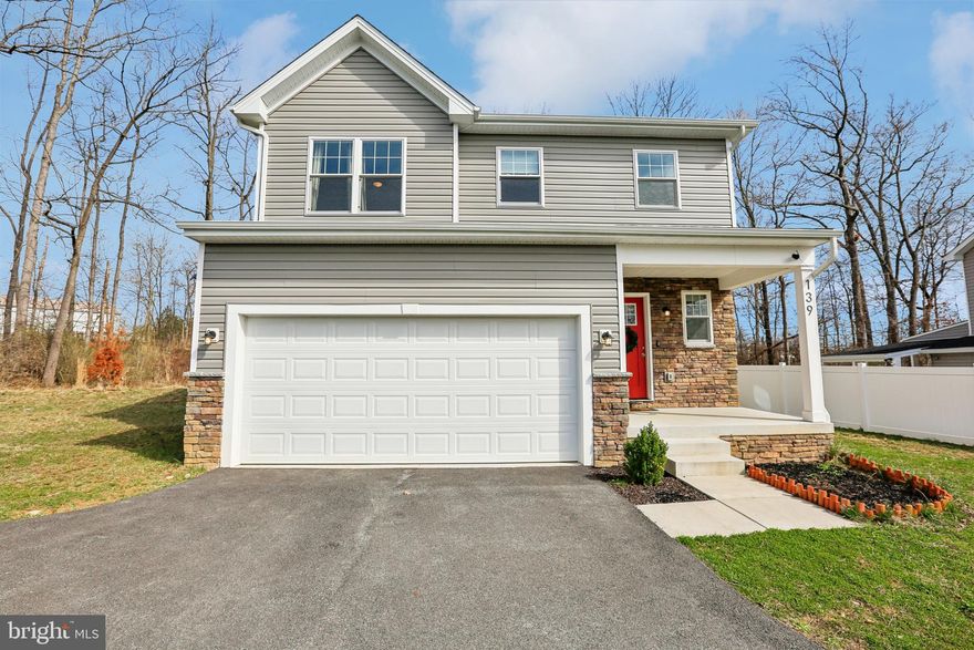 Tired of high energy bills? This home offers a major advantage with solar panels already installed, helping keep utility costs impressively low.
This beautifully designed single-family colonial features approximately 2,200 square feet with 4 bedrooms, 2.5 bathrooms, and a spacious two-car garage. The open-concept layout creates an inviting space perfect for both everyday living and entertaining.
The dining area flows seamlessly into a custom kitchen with a large island, quartz countertops, pendant lighting, and stainless steel appliances, making it ideal for hosting. A sliding glass door opens to a generously sized backyard, perfect for outdoor gatherings, play, or relaxation.
Upstairs, the primary suite offers a private retreat with a luxurious bath and dual vanities. Three additional bedrooms provide ample space, along with a stylish hall bath featuring dual sinks. A convenient second-floor laundry room adds everyday ease.
Additional highlights include a striking open staircase with designer lighting, an oversized garage, and an unfinished basement ready for your personal touch. This home is a perfect blend of space, style, and efficiency.