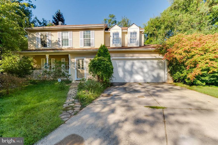 BACK ON THE MARKET! Tastefully updated and meticulously maintained 4 bedroom, 3.5 bath home. Main level includes an added foyer with 2 closets, a half bath, sun filled dinning room with floor to ceiling windows and a sitting room off the kitchen. The fully renovated, gourmet, eat-in kitchen features stainless steel appliances, granite countertops, custom 42' cabinets, induction cooktop and an added and bumped out,  bay window. The spacious family room with a wood burning fire place opens to the deck and garden oasis. The upper level features 4 bedrooms, 2 full baths, a spacious landing, hardwood floors, a large primary suite with walk-in closet and bathroom with cathedral ceiling as well as a  jacuzzi tub. Guest bedrooms are spacious with plenty of closet space. The finished lower level features a full bath with front loading washer and dryer, cedar closet, plenty of additional storage/closet space, a second refrigerator and space for a potential added bedroom. The backyard features a small pond with fish, private deck, fenced yard as well as fig tree, blackberry and blackcurrant shrubs, kiwi vines, dogwood and mulberry trees. Great location on tree-lined, no-thru street. Minutes to Columbia Mall, restaurants, Howard County General Hospital, walking paths and other amenities. Easy access to Routes 32, 29, I-95.