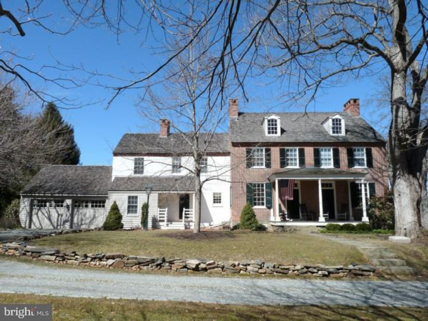 The Job Peirce House is a 5 BR, 3/2 BA historic Quaker Farmhouse, circa 1830, situated on a private park-like 6-acre lot in the award-winning Unionville Chadds Ford School District.  Current owners have made extensive, high-end upgrades that blend historic integrity with modern conveniences.  Exterior combines brick, wood-siding, stone and traditional stucco construction; cedar shake roof was installed in 2008. Hardwood floors throughout the house and nine-over-six windows, some with original glass, add to the authentic feel of the home. When entering the home you will marvel at the Formal Dining Room and Living Room; each has a fireplace (there are 8 fireplaces in the house) and extensive mill work; large doors can be closed to separate the rooms.  The Waterbury-renovated Kitchen has a large island with gas cook top, built-in oven and microwave, farmhouse sink and original fireplace.  Older section of the house includes Library and charming Breakfast/Morning room.  A John Milner-designed addition has a sun-filled Family Room, Pantry, Laundry Room, and generous Family Entrance. The Second Floor has a Master Bedroom with private Bath, three other Bedrooms (one is currently used as an Office), a hall Bathroom and a two-room Suite. Suite has separate full Bath, separate staircase from First Floor, a cozy Sitting Room, and a Bedroom with a convenient Dressing Area. Extensive storage opportunities in large bedroom closets, built-in cabinets, linen closets, walk-up attic and unfinished, walk-out basement.  Original dairying cellar is in good condition, currently used as a wine cellar.   At Lower Level, finished "Potting Room" with electricity and water is accessed from the outside.  House is heated with oil and propane; zoned radiant heat and forced hot air; whole house is air-conditioned; public water; on-site septic system.  There are 2 barns on the property. The older is a 2-stall open carriage barn circa 1880. The newer barn, 20'x30', built in 2005, with electricity and water, is currently used as a wood-working shop; could be used as a garage for cars and/or other vehicles. Garden offers mature trees and shrubs, a fruit orchard, a small stream and discreet deer fencing around entire property. This outstanding property is located in the beautiful Brandywine Valley, close to Longwood Gardens, Winterthur, and Chadds Ford, numerous other cultural venues, schools, and many shopping and restaurant options; easy access to Wilmington, Philadelphia and the Airport.