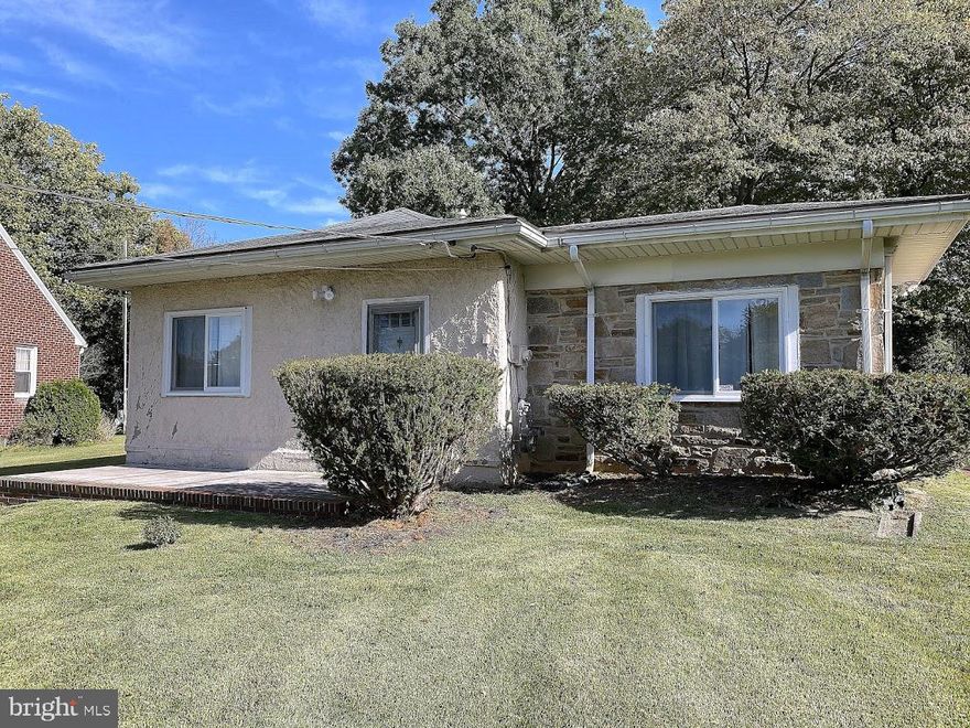 You will fall in love with this charming 2 Bedroom, 1 Bath rancher that is perfectly situated on a premium oversized lot.  With just over a half an acre on a non-through street in Rosedale, this home is only minutes from the beltway but far enough away to enjoy some peacefulness.  If you love the retro vibe, this home is calling your name.  Very unique ceramic tile flooring  and cozy wood paneling create the beauty of years gone by. There is a rear family room/den that can easily be turned in to a 3rd bedroom if needed and a one car garage with electric that can be used for your car or your belongings.  Mostly newer appliances are a bonus.  Being sold AS-IS but the house is super clean and you can move right in.