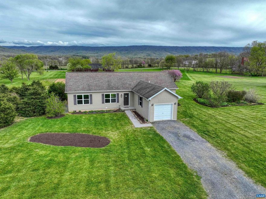 This updated ranch home, situated on a spacious 1.5 acre lot, boasts breathtaking panoramic views that stretch as far as the eye can see. The property has been recently updated and comes with a variety of amenities, including a hot tub, shed, and a garden that's ready for planting. As you step inside, you'll notice the new luxury vinyl plank flooring, fresh paint throughout, new lighting fixtures and fans.  And, the recently stained deck provides the perfect spot for relaxing and enjoying the hot tub and the views on warm summer evenings. Overall, this updated ranch home is a true gem that offers both comfort and luxury, all while being surrounded by stunning natural beauty. Easy access to I-81 for commuting to Harrisonburg, or only a 20-min drive to Four Season Fun at Bryce Resort, or 25 miles to Shenandoah National Park.,Solid Surface Counter,Wood Cabinets