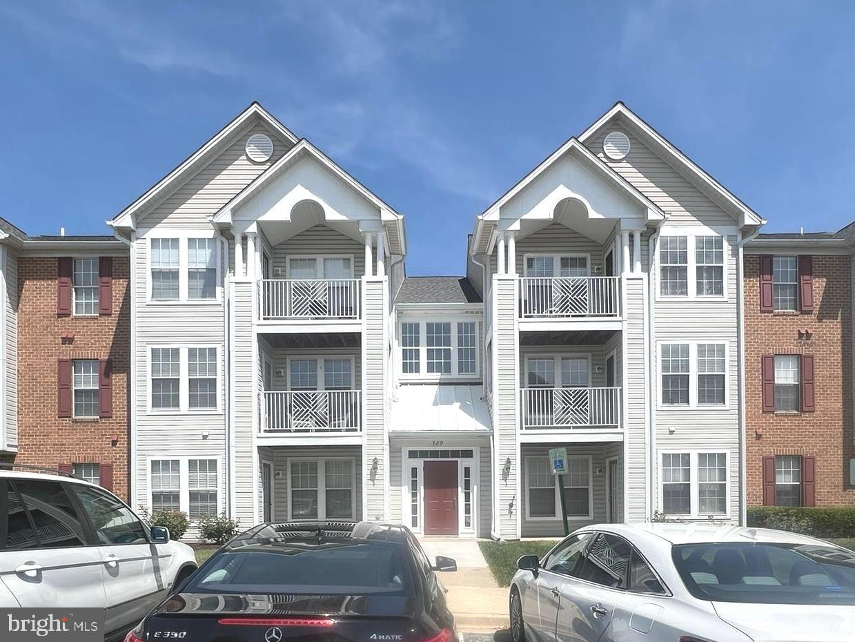 Beautiful mid level condo featuring wood flooring throughout in Piney Orchard. Bright and sunny open concept floor plan with 2 bedrooms suites. This condo features a huge living room/dining room with french door to balcony. Gorgeous kitchen with granite counters, stainless steel appliances and breakfast bar. Primary bedroom suite features attached full bathroom and walk in closet along with built ins and window seat with storage. 2nd bedroom suite has access to dual entry full bathroom. Separate laundry room with full size washer and dryer plus some storage. Many community amenities include pools, recreation center, jog/bike paths, tennis courts, playgrounds. Conveniently located to schools, shopping, MARC station, NSA, Ft Meade, Annapolis, Baltimore, and D.Cl, major highways. Tenant occupied with 24 hours notice required. Home will be professionally cleaned.