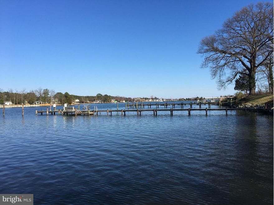 Waterfront Building Lot on Protected Neale Sound on Cobb Island (Boaters Dream) and close to Potomac River! Older home needs to be removed to build your Dream Home! Long Pier already exists, Home is connected to Public Sewer but needs new well. Pick your House Plans, there is NO HOA, just a little piece of heaven waiting for you to make it your own. Get it while you can, and build when ready!