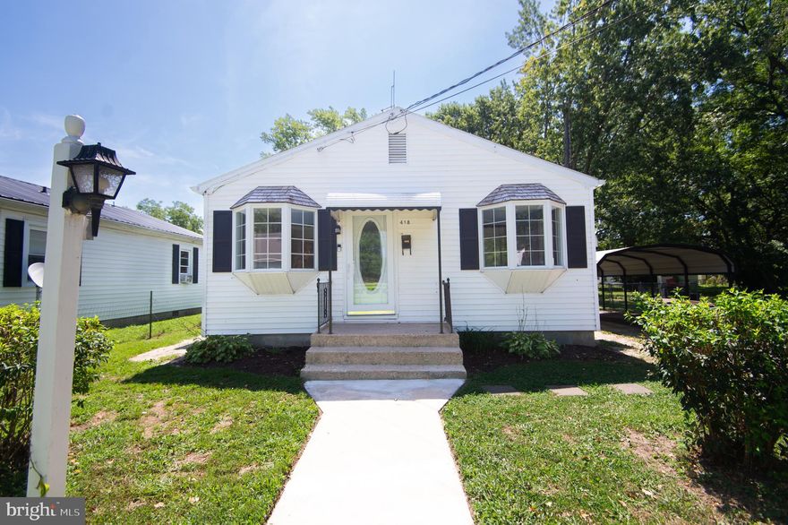 Discover the hidden charm of this 2-bedroom, 1-bathroom home, perfectly situated within a short stroll to downtown Cambridge and the YMCA. Boasting a newly installed ceramic tile bathroom, a modern heat pump with central air conditioning, a freshly painted interior, and a brand-new porch roof, this residence is full of recent upgrades. The property also features a generous fenced backyard with a shed and covered lean-to storage, a paved driveway with a detached carport, and new landscaping. For qualified buyers, 100% financing options are available. This home is truly move-in ready