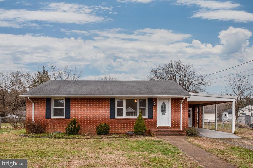 CHARMING BRICK RAMBLER  CLOSE TO DOWNTOWN FREDERICKSBURG,  SHOPPING AND VRE!  HARDWOOD FLOORS, NEW HVAC AND PAINT WITH A LOVELY REMODELED BATHROOM!  NICE LEVEL LOT,  LARGE STORAGE SHED, SEPARATE UTILITY ROOM AND COVERED CARPORT INCLUDED.