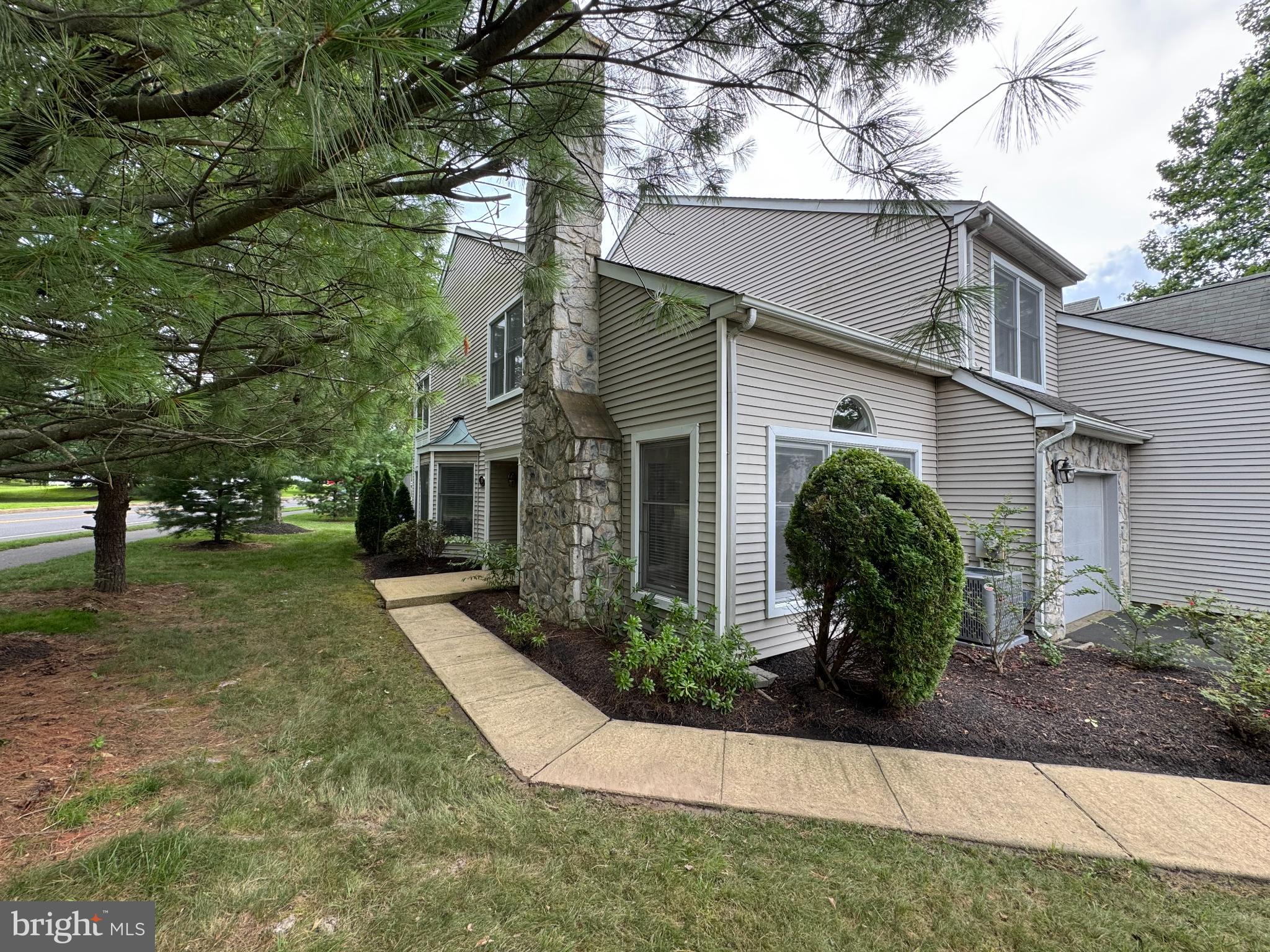 Welcome to this spacious townhome in the highly sought after Newtown Gate! This end unit has almost 2300 square feet of living space, great light throughout, and an open, modern layout. The first floor features a large kitchen offering plenty of cabinets and counter space, newer appliances, and a light and bright eat-in area. The living room features a vaulted ceiling and cozy fireplace and is nicely situated off the entrance offering a separate place to entertain or relax. The combination family room/dining room area is conveniently located off the kitchen with sliding doors leading from the family room to the outdoor patio space where you have some inherent privacy as the end unit. The second floor features a very large primary suite with sitting area, a primary bathroom with tub, separate shower/toilet area, and dual sinks. The primary suite also has not one, but 2 large walk in closets to help keep organized! Two additional bedrooms, a full bath, and a laundry area complete the 2nd floor.
Flooring in the entire home has been replaced with hardwood, making it easy to keep clean. The kitchen features a stylish granite floor.
Newtown Gate is convenient to downtown Newtown with its charming shops and restaurants, both Core Creek and Tyler State Park, and several grocery stores. Commuting is easy with access to Rt 295, Rt 1, as well as public transportation. And you can't beat the Council Rock school system - one of the most prestigious in the State!