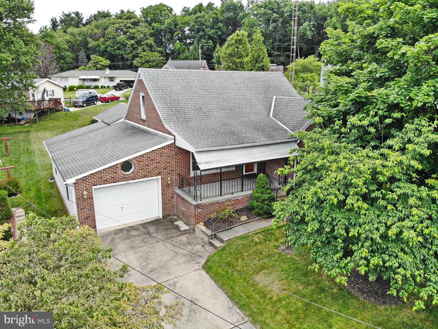 All Brick Cape Cod- Newer Kitchen Cabinets - 6 Panel Wood Doors - Wood Flooring - 3rd Bedroom on 2nd Floor with 1/2 Bath and 1 Mirrored wall - Full unfinished Basement - Enclosed Patio behind Kitchen - Garage is 34 ft Long - can hold two cars- New Solid wood 6 panel doors - New wood floors in Living and Dining Rooms- South West School System