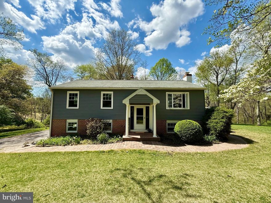 Welcome to 1424 Oakwood Road! This hidden gem is nestled in the beautiful suburbs of West Bradford Township and located within the highly regarded Downingtown School District.

Set on a 1.1-acre lot at the end of a quiet cul-de-sac on a private road, this 4-bedroom, 3.5-bath bi-level colonial backs to a serene wooded setting. With 1,396 above-grade square feet and an additional 867 finished square feet below, the home offers ample space for both everyday living and effortless entertaining.

Step inside and head upstairs to the bright, open-concept main living area, where the living room, kitchen, and dining space are filled with natural light from a charming picture window and sliding glass doors. The spacious living room flows seamlessly into the eat-in kitchen, which features tile flooring, granite countertops, a marble subway tile backsplash, and a large island with abundant storage.

The dining area easily accommodates a full-sized table and opens directly to the expansive Trex deck (2019)—perfect for grilling, hosting, or simply unwinding while enjoying the peaceful backyard views at sunset.

Down the hallway, you’ll find a full hall bath and three bedrooms, including the deceivingly spacious primary suite. Recently renovated, this retreat offers a large walk-in closet and a private ensuite bath complete with a stand-up shower and double sinks.

The lower level provides even more flexible living space, featuring a generously sized family room with new carpeting, a brick fireplace, and sliding doors leading out to the patio and yard. This level also includes a fourth bedroom with its own full ensuite bath, a convenient half bath, laundry room, garage access, and all mechanicals.

Additional highlights include a radon mitigation system, Aquasana whole-house water softener, electrical subpanel for a generator (generator not included), a new oil tank in January of 2025, and new PEX plumbing installed in 2020. Much of the home also has a fresh coat of paint, making it a blank palette for your unique decorating touches. 

Ideally located near major routes including US-30, the home offers easy access to both Lancaster and Philadelphia. SEPTA & Amtrak offer nearby public transportation options. With most shopping & errands within 2 miles, everyday convenience is right at your fingertips. 

1424 Oakwood Road truly has so much to offer—but don’t take our word for it. Schedule your private tour today and experience it for yourself!