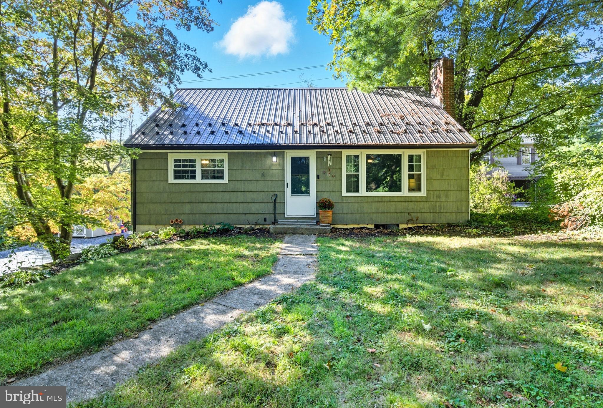 OPEN HOUSE: Sun, Sep 14 1:00 PM - 2:30 PM | Enchanting gem tucked away on a secluded .83 partially wooded acre lot. This spectacular setting backs to the beautiful Stan Yoder Memorial Reserve consisting of 12.55 wooded acres as well as a trail that goes around the Boal Mansion & leads to Boal City Brewery. This unique property was built by the seller’s grandparents in 1955 & has been family owned since. Lovingly maintained Cape Cod features captivating curb appeal & mature lush landscaping. Once inside you will be greeted by an inviting living room featuring oak hardwood flooring, a cozy wood-burning fireplace & charming built-ins. The gorgeous kitchen delivers custom cabinetry, soapstone countertops, tile backsplash, soapstone farmhouse sink, laminate flooring & comes complete with included stainless appliances. The main floor also features 2 nicely sized bedrooms both with carpeting & a remodeled full bathroom with ceramic tile flooring, vintage cast iron soaking tub, tile shower surround & a vanity with granite top. Upstairs discover 2 additional nicely appointed bedrooms both with laminate flooring & another full bathroom with tile floor, new tub & tile shower surround. The walk-out lower level boasts a bedroom, laundry room & plenty of unfinished space for your storage needs. The rear deck is the perfect location to overlook the serene backyard. Additional amenities include electric heat pump, central air & propane forced air heat. Private location yet moments from all the charm of historic Boalsburg, Tussey Mountain, easy access to 322 & just 6 miles to Penn State University. The ideal location for someone who yearns for privacy yet the convenience of having everything you need close by.