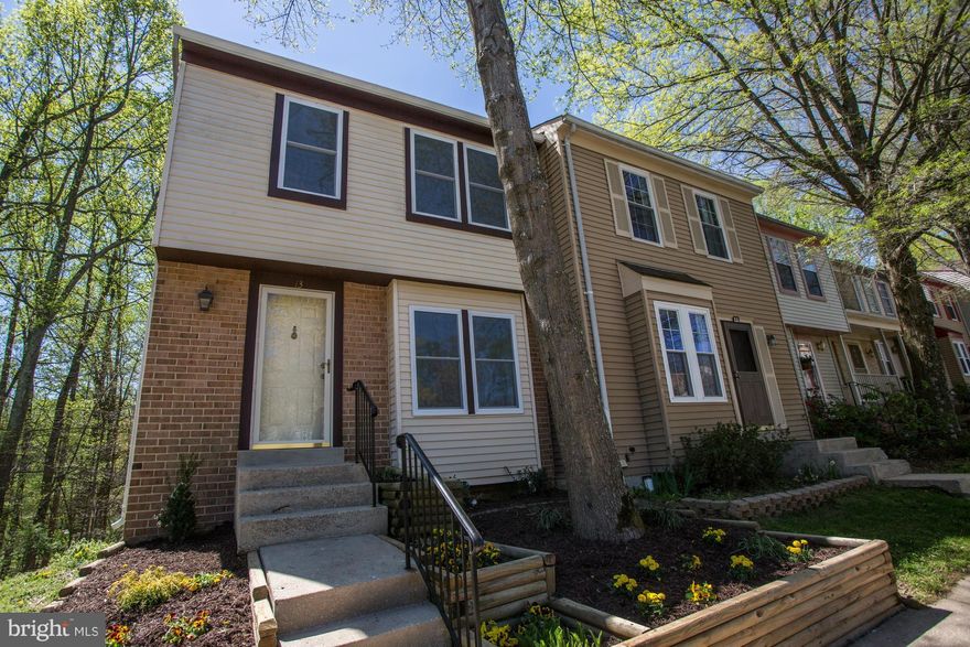 Another amazing listing by Amiricon: Stunningly beautiful & thoroughly renovated to perfection, shows and feels like a brand new house. Fine quality designer-style open kitchen w/ dine-in peninsula, stylish modern backsplash, new SS appliances, hardwood flooring/ new carpet/ fresh paint, custom design bathrooms, finished walk out basement, new HVAC & washer/ dryer. w/ deck back to woods.