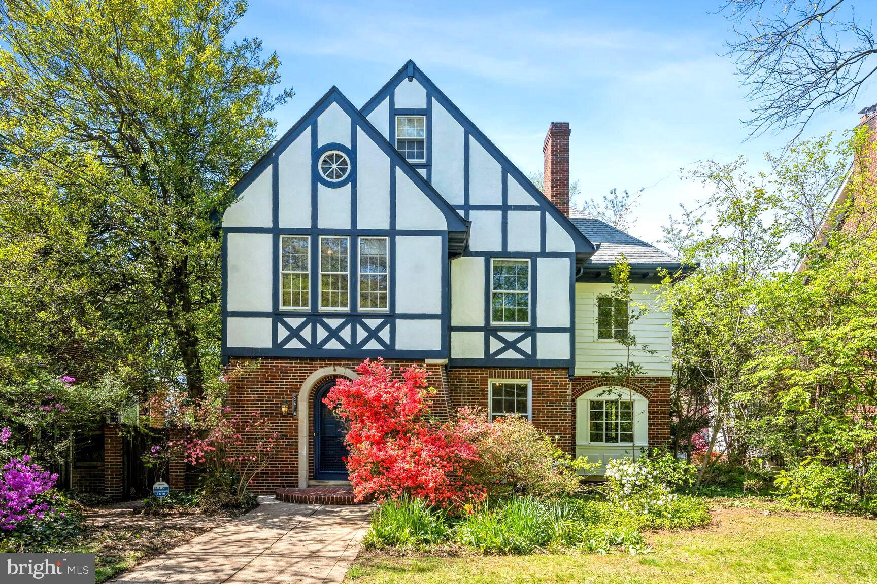 ********Offered deadline set for Wednesday 4/24 at 12 noon. *****Classic 1928 south facing Tudor with great curb appeal and charming details! Over 4200 sq ft with grand entry foyer, spacious living room w/frplc, formal dining room with French doors off updated kitchen with a pass through breakfast bar, and adjoining sunroom ideal for family room. Upstairs boasts 4 sizable bedrooms with 2 full baths and another sunroom easily converted to primary suite walk-in closet and expanded bath. Finished walk up attic with wide gracious stairwell has another large bedroom and optional family room or getaway space and full bath. The basement provides another full bath, a large laundry room and access to 2 oversized 1 car garages! Fine features include warm hardwood floors, high ceilings, large elevated deck, a deep front and rear yard, and literally 1.5 blocks to the vibrant commercial strip of Connecticut Ave and 10 min stroll to metro! A wonderful historic home in one of the nation’s best school districts awaits your personal touches!