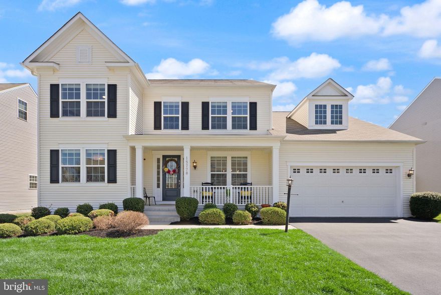 Welcome to this fantastic Haymarket home that has everything you've been looking for!  This property is loaded with recent upgrades and comes to market fully move-in ready.  Entering the Villages of Piedmont II neighborhood leaves a great first impression, which only gets better as you pull up the home and notice its beautiful curb appeal - a clean and crisp exterior, fresh landscaping, and lovely front porch set this one apart!  This 2016-built home offers 4 bedrooms, 3.5 bathrooms, and over 5200 total square feet that you'll feel as soon as you walk in the front door. Enter into a large dining space that flows perfectly into the main living room, kitchen, and sunroom bump-out that are the epitome of open floor plan living.  The living room is bathed in natural light and boasts plenty of space for furniture, and multiple layout options.  The kitchen is a dream - you'll have so much cabinet space, a nice dark island, stainless steel appliances, granite countertops, and a huge walk-in pantry!  The sunroom bump out can easily be used as an eat-in space as demonstrated here, or a second living room, play area, or whatever you can dream up!  This level also offers the opportunity for MAIN LEVEL-LIVING!  A very spacious primary suite (1 of 2!) boasts a great bedroom and a large full bathroom with double vanity, soaking tub, standup shower, and walk-in closet!  Main level living is so difficult to find anywhere in NoVA, and it's executed so well  in this home. The main level is also home to a laundry room/mudroom, and a pretty half-bath. Upstairs you'll find 3 bedrooms and 2 full bathrooms, including primary suite number 2 complete with another full-size bathroom and walk-in closet!  The additional 2 bedrooms on this level can easily fit any bed size of your choosing, which is always important, and share a full hallway bathroom. Plus, your second laundry room is upstairs too!  The lower levels features a 1900+ square foot space ready for you to make it your own. That said, the basement gets so much natural light, that it might not even be necessary - make it a great home gym, rec space, storage area, or all of the above!  Outside you'll enjoy a beautiful Trex deck that walks down to a stone patio where you can relax, while also enjoying plenty of wonderful yard space.  Upgrades include all fresh paint (2026), all carpets brand new (2026), new light fixtures (2026), brand new furnace (2026), and fresh landscaping and exterior power washing.  The icing on the cake is the location - you're just 10 minutes away from Gainesville's Gateway Center that is loaded with shopping, grocery stores, Target, BJ's Wholesale, Lowes, and so much more. Plus easy access to major commuter routes!  This home truly has it all so be sure to come see it for yourself!