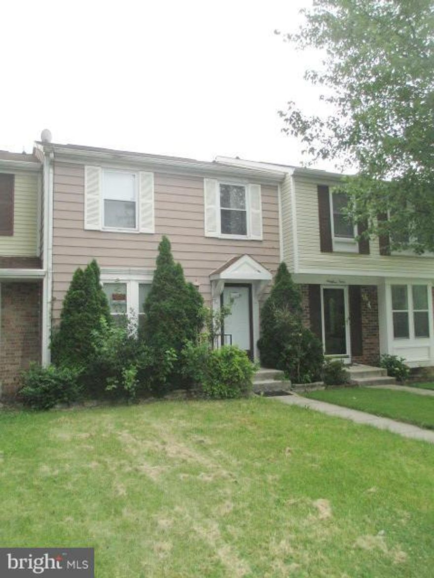 Well priced home in super convenient location needs only a little TLC to really make it shine. Finished walk-out lower level has a good sized family room, 1/2 bath & fireplace. 1stt floor includes good sized living room, 1/2 bath, dining room plus an eat-in kitchen w/all appliances. A deck opens off kitchen. 2nd floor has two bedrooms & a bath. Buyer pays all transfer taxes as seller is exempt.
