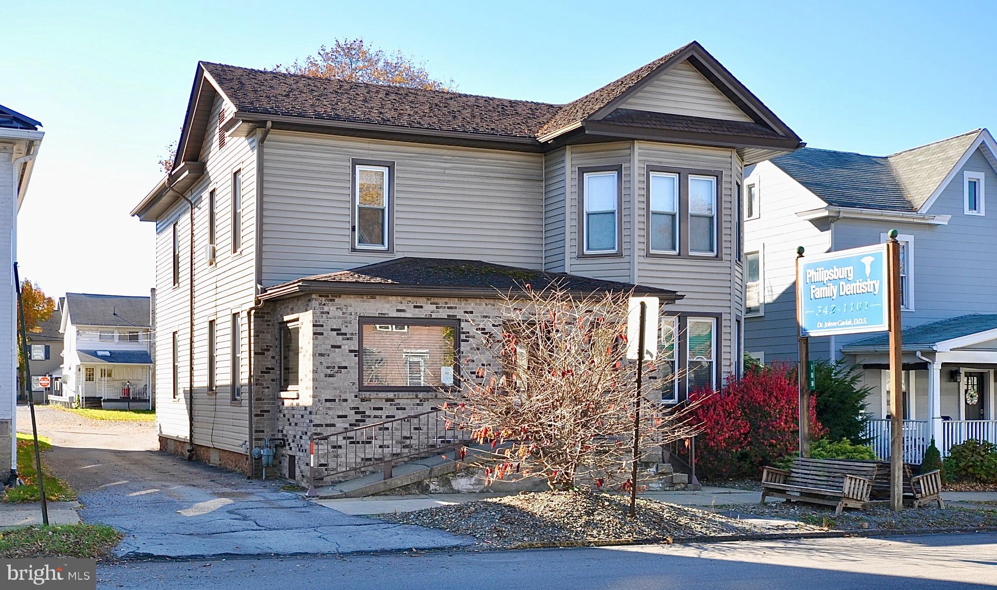 Located in the heart of Philipsburg, this two-story professional building offers a fantastic opportunity for businesses or investors. Situated in a highly visible location along State Route 322, the property is easily accessible with on-street parking and a dedicated parking lot.
First Floor (1,521 square feet):
The first floor offers spacious office space ideal for a variety of professional uses. It includes a welcoming waiting room, a reception area, and a restroom, making it perfect for any office-based business.
Second Floor (257 square feet):
The second floor offers a cozy break room, a private office, and a full private bath for ultimate convenience and privacy.
Additional Feature - One-Bedroom Apartment (1,100 square feet):
Also on the second floor is a well-sized, one-bedroom apartment with ample closet and storage space. The apartment has a private entrance, offering the potential for additional rental income or as live-in space for the business owner or staff.
The building previously operated as a dentist office until June 2024. Dental equipment is visible in the photos and is available for purchase separately, or the equipment can be removed if not needed.
This versatile property provides a unique combination of office space, residential living, and potential business uses, all in a prime location in Philipsburg.
Owner is the Listing Agent.