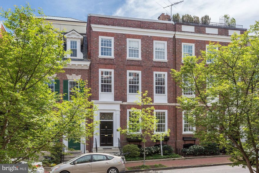 PRICE REDUCED! Rarely available 6BR/5.5BA grande dame home on Leroy Place, in first block off Connecticut Ave. So quiet and convenient to everything   Dupont Red Line Metro, Sunday farmer s market, Mitchell Park, several gyms, restaurants, Glen s Garden Market, The Phillips Collection, Cosmos Club, Rock Creek Park s paved paths and more.The entry level features a generous reception/music room, living room with fireplace, large dining room with fireplace, powder room and kitchen. The kitchen has a bay window built-in banquette and table, opening to a deck that s steps down to the glorious private garden, enveloped with wisteria. The second floor is used as an expansive master suite, with a generous room-sized closet and and a second bedroom (currently used as a large study/office) and two full baths. Third floor features three bedrooms and two full baths, plus monument view. The lower walk-out level has its own private in-law suite (or office) with its own kitchen and bath that has been rented in the past. Exquisite moldings throughout that haven t been wrecked with layers of paint. True two-car garage!