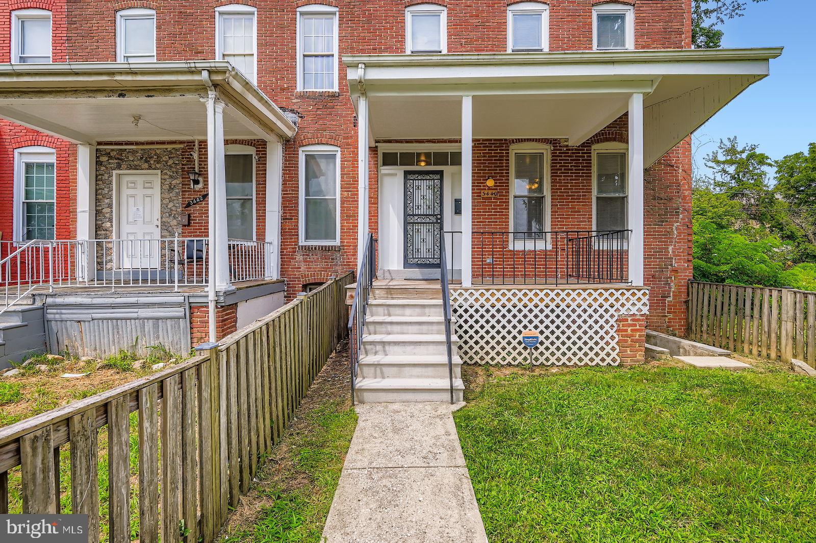 Welcome to 3440 Virginia Avenue, Baltimore, MD 21215—an updated three-bedroom rowhome in Central Park Heights offering value, convenience, and room to grow. The main level features a classic separate living and dining room layout with durable laminate flooring and ceiling fans for comfort. The renovated kitchen shines with stainless steel appliances and direct access to the fully fenced rear yard and off-street parking pad—rare at this price point. Upstairs, you’ll find three well-proportioned bedrooms and a refreshed full bath. An unfinished lower level provides excellent storage and future expansion potential (home gym, rec room, or workshop—your choice).
Location perks abound: Central Park Heights continues to benefit from ongoing neighborhood reinvestment and revitalization efforts, with nearby improvements around Pimlico and along key corridors. Daily commuting is easy with access to multiple bus lines and the Metro Subway, plus close proximity to major routes. Everyday essentials and employment centers are nearby, including Sinai Hospital, Baltimore City Community College (Liberty Heights campus), and shopping at Mondawmin. Weekends are covered too—enjoy the Maryland Zoo and sprawling Druid Hill Park, and the energy of the Pimlico Race Course just minutes away.
Features: 3 BR, 1 BA • renovated kitchen w/ stainless steel appliances • separate living & dining rooms • laminate flooring • ceiling fans • fully fenced front & rear yards • off-street rear parking • unfinished basement for storage/future finish.