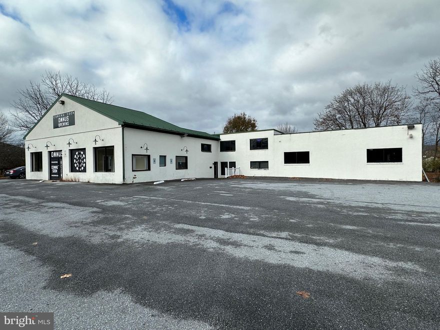 Prime opportunity to buy or lease a 9,100 SF flex building with a huge parking lot in the heart of Downingtown. For many years, this property was home to a very well known auto sales and service business. The flexible layout and zoning makes this property suitable for a number of different uses including, but not limited to: Auto Sales, Auto Service, Equipment Sales, Bar/Restaurant, Daycare, Gas Station and other retail uses.

The building could potentially be split into multiple units, making it a great opportunity for both users and investors. The property consists of retail/showroom, office and warehouse space with 10-14’ ceilings. The 1.4 acre lot has excellent signage and visibility, with 282’ of frontage along Business Route 30.

Located in a high traffic area near the corner of Lancaster and Lloyd Ave in Downingtown Borough. Traffic counts on Rt. 30 are around 11k VPD with another 6k VPD on Lloyd Ave. Great accessibility to all the major highways including the 30 Bypass, 202, 76 and 322. Asking $1.7M for sale or $11k/month NNN for lease. Call for additional info.