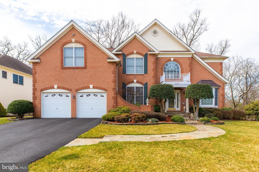 *OWNER RELOCATED VACANT -Owner Financing is possible - 25% Cash down, 75% Loan Interest rate 5%, 30 years term, 3 years balloon payoff.
Toll Brother Brick Federal Harvard, a Former model home on a corner lot loaded with many options and numerous upgrades- backing to trees. This magnificent 4 spacious bedrooms and 4.5 bathrooms and 1 den estate home features over(about) 5,996 SQFT on 3 fully finished levels with a fuzed three-car sized garage attached to 2 separate door entries. 
As you enter this home, you are greeted by a dramatic, grand-story foyer with a brilliant chandelier that opens to the living room and a private first-floor study with elegant double doors. Left of the foyer is the private office with built-in bookcases. The right of the foyer leads to a spacious and grand living room with a door that can be used as 2nd office for work at home and a dining room with a new French door. French doors provide the convenience of using the dining room and living room as open and closed flexible spaces. 

Well-equipped, granite-topped, custom remodeled gourmet, modern kitchen surrounded by a large island with stainless steel appliances attached to the sunlit breakfast area with Chef Selection refrigerator and two luxury oven sets. next to the kitchen leads to the sunroom with natural skylight (bringing plenty of warmth and light) and hardwood ceilings, leading to huge Trex deck access and a beautiful tree/woods view backyard.
The expanded, generous two-story family room is spacious with palladian windows, a floor-to-ceiling brick fireplace, and a built-in entertainment niche. Attached are dual staircases with warm wood floors with nine-foot ceilings throughout the first floor, and a private stairway leading to the second floor. The modern touch of expanded wainscoting and moldings throughout the entire house.
The rear stairs lead to the upper level with four ample bedrooms with a princess suite and a private bath. The Master bedroom suite with a large sitting area includes cathedral ceilings, a large French doored closet, an adjacent custom-made walk-in closet, an ensuite bathroom with double vanities, a jacuzzi tub, and a shower with dual showerheads. 
There are three additional spacious bedrooms upstairs with 2 bedrooms sharing a jack-and-jill full bathroom and 1 bedroom with a private bathroom. All four upper-level rooms include modern ceramic tiled floorings.
Fully finished sunfilled, walk-out basement  (additional sq ft. of living space)with gym/sunroom area, large open custom entertainment area, additional recreational space, and full bath. and 1 den which can be used in a bedroom)A huge white projection screen, glowing ceiling, and mounted speakers in the NEW 2022 media room. Storage space has wooden shelves, which are good for storing quantities.

Outside property features: unique brick front and multi-gabled roofline accented by dentil moldings, portico entrance (covered front entry), gorgeous stone stairs in front of the house, beautiful lush plantings, curb appeal hardscaping, and custom lighting, and a home backs to open space with private forest- wonderful open view of the rear yard. The estate is exceptionally meticulous in details, upgrades, and options.
 automatic sprinklers throughout the whole yard, stone/pebbled patio, Silhouettes by Hunter Douglas curtains over $40,000, sound music speaker system, security systems, internal cabinet lightings, automatic kitchen cabinet doors, Chef Selection refrigerator, two luxury oven sets, No-touch auto-switch throughout the whole house, white marbled floored foyer.

*Improvement features $340k. -details provided by previous sellers 
2022-2023 update over $50,000 details provided by present seller 
NEW Carrier HVAC 
A new huge white projection screen, glowing ceiling, and mounted speakers in the media room
New bedroom/study in the basement
New French door in the living between the dining room
New door/wall installed between foyer/living room.

photos were taken in  2022,