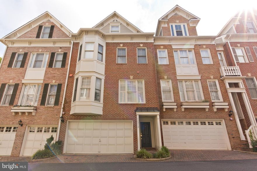 Beautiful townhome in the heart of Arlington's East Falls Church neighborhood, now available at an amazing rent of $4,900/month. All four bedrooms have a full bath! This gem boasts an open floor plan, 9-ft ceilings, hardwood floors, crown molding custom built-ins, a gourmet kitchen, and a lovely outside fenced-in patio. The fabulous kitchen features a bright bay window with an eat-in breakfast nook and granite countertops. The kitchen opens to a spacious family room, perfect for those evening board games or Seinfeld re-runs. The upper two levels include a large master suite with vaulted ceilings, walk-in closets, plus 2 more bedrooms, each with a full bathroom. The bottom level includes the fourth bedroom and laundry area. The location is ideal: 2-3 blocks to East Falls Church Metro and 5 blocks to downtown Falls Church.