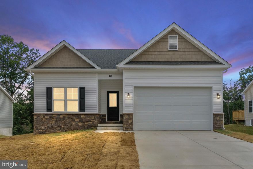 This builder spec home with white siding and black shutters & front door will be completed mid summer. Have you been dreaming of a home that offers one-level living? Perhaps you have been strategizing to make a plan to retire in place. Warfield Homes Inc. has been building custom homes in the Northern Shenandoah Valley for over 30 years. You'll love the openness of the floor plan, the 9' ceilings & the luxury vinyl plank flooring. The kitchen is beautifully finished with white soft close cabinets, stainless steel appliances & quartz countertops. The primary suite features an enormous walk-in closet, dual sinks & a custom shower with floor to ceiling tile. A $2,000 closing cost credit is available with the use of the builder's preferred lender.