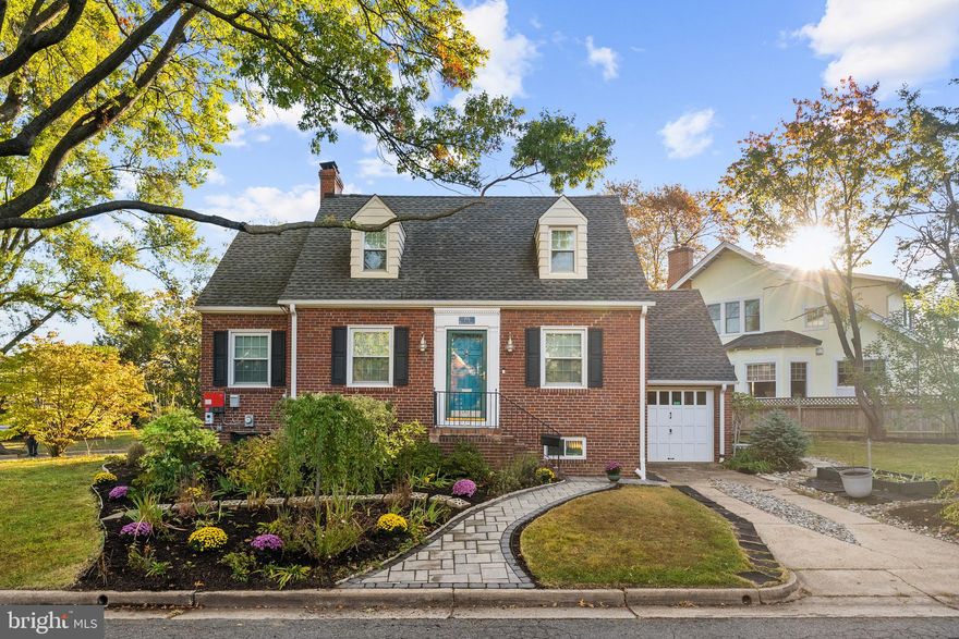 Welcome to 715 W. View Terrace, an exceptional 3-bedroom, 3-bath brick Cape Cod on a rare corner property in the sought-after George Washington Park neighborhood—just moments from Old Town. Expanded, thoughtfully updated, and offering flexible living across three levels, including a partially finished basement, this home blends historic charm with modern comfort in a truly special setting.
From the moment you arrive, timeless details set the tone: graceful archways, crown molding, wainscoting, custom millwork and built-ins, refinished hardwood floors, and a welcoming fireplace create warm, inviting interiors designed for both everyday living and effortless entertaining. Large windows and skylights flood the home with natural light, and nearly every inch has been thoughtfully refreshed.
The main level features an updated galley kitchen with granite countertops, subway tile backsplash, newer appliances, and a large pantry. Open to the kitchen, the light-filled family room with bay window and skylights offers easy access to the attached one-car garage and the rear patio and expansive backyard, complete with a cleverly designed mudroom nook. Also on this level is a formal living room with fireplace, a formal dining room with custom built-in cabinet, an updated full bath, and a sun porch that can flex as a bedroom, home office, playroom, or creative space.
The upper level includes a spacious primary bedroom with walk-in closet, a second bedroom with generous closet space, a hall closet, and a beautifully updated full bath. Refinished hardwoods, upgraded lighting, and classic detailing continue throughout.
The lower level provides additional flexible living options, ideal as a secondary family room, guest suite, or au pair/in-law space, complete with a full bath, laundry area with new flooring, exterior access to the side yard, abundant storage, and two encapsulated crawl spaces.
Outside, this property truly shines. Thoughtfully designed walkways, patios, and a gazebo are seamlessly integrated into lush, mature landscaping, creating a private and serene setting for relaxation or gatherings with friends. The gardens feature an exceptional collection of perennial flowers and other plantings including a thriving pollinator garden—offering beauty and interest throughout the seasons.
Countless upgrades add peace of mind and efficiency, including a newer roof (2016) with solar panels providing approximately a 25% reduction in electric costs, an EV charger (2024), newer windows and skylights, upgraded lighting, fresh paint throughout the interior and exterior (2025), energy-efficient air sealing and insulation, basement encapsulation (2020), a professionally graded yard and a basement sump pump with French drains (2020), making this home truly move-in ready. Parking is abundant with a garage and driveway accommodating up to three cars, a rare find this close to Old Town.
The location is equally exceptional: walkable to King Street Metro, VRE, Amtrak, Old Town, Douglas MacArthur Elementary School, neighborhood parks, and local favorites for dining, fitness, and shopping. This home shines in community spirit, too! Catch up with neighbors along the tree-lined streets. Commuters will appreciate easy access to Washington DC, The George Washington Parkway, and major highways.
This is a home that offers not just a place to live, but a lifestyle to love. Historic charm, exceptional outdoor space, abundant off-street parking, walkability, and modern convenience all come together in one remarkable Alexandria offering. Welcome home!