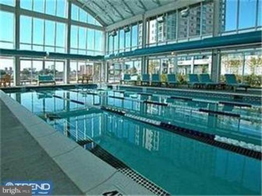 Live in luxury and tranquility in this expanded Waterfront Square two bedroom unit.  The unit features unbeatable NE up-river views from the living area and beautiful unobstructed bridge views from the unit's deck, expanded storage, 2 large bedrooms, in-unit laundry, upgraded kitchen, upgraded lighting, expansive living area with light wood flooring, and fabulous natural light throughout.  The community offers gated security, 24/7 concierge, valet parking, 10,000 square foot fitness center, pool, riverside decks, secure walking area, Center City shuttle and on-site management.  This unit has been very well maintained and is in pristine condition- no pets, no smoking.